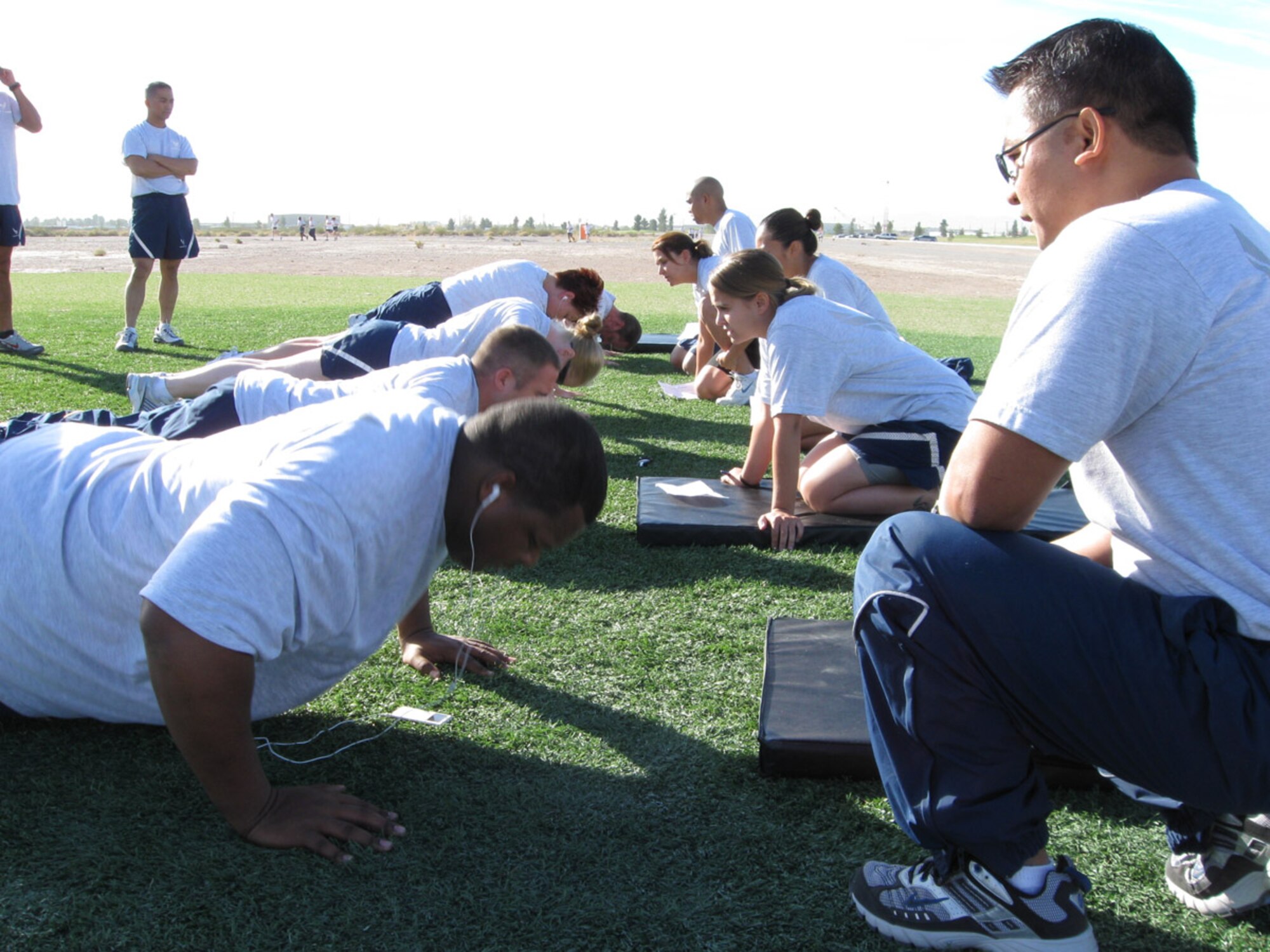 A line of 926th Group members push it out during a Unit Training Assembly on Oct. 24.

The UTA, held Oct. 24-25, brought approximately 135 of the group’s Traditional Reservists, Active Guard and Reserve members, and Air Reserve Technicians together to train and prepare for possible contingencies, as well as daily job responsibilities. 

The two-day drill began with a physical fitness test that assessed individuals’ height and weight, a 1.5-mile run, sit-ups and pushups. The weekend also included a Commander’s Call, where members were briefed on many issues from finance to the deployment process. 

Throughout the drill, reservists were provided with flu shots and legal assistance for wills and Powers of Attorney.