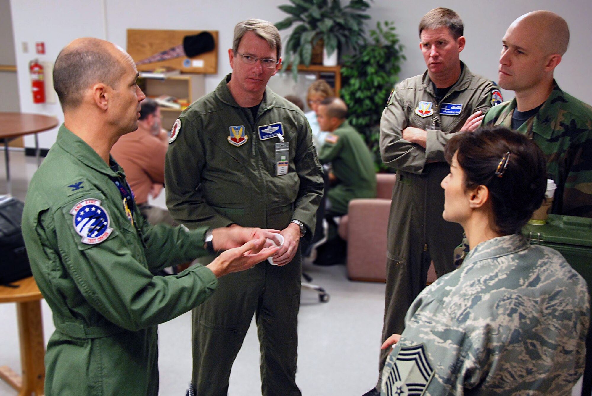 Col. Dan Bader, commander of the Air National Guard Air Force Reserve Command Test Center (AATC), speaks with Guard and Reserve Airmen at the annual AATC Weapons and Tactic Conference (WEPTAC) outside Tucson, Ariz. (Photo by Master Sgt. Mike R. Smith, National Guard Bureau) 
