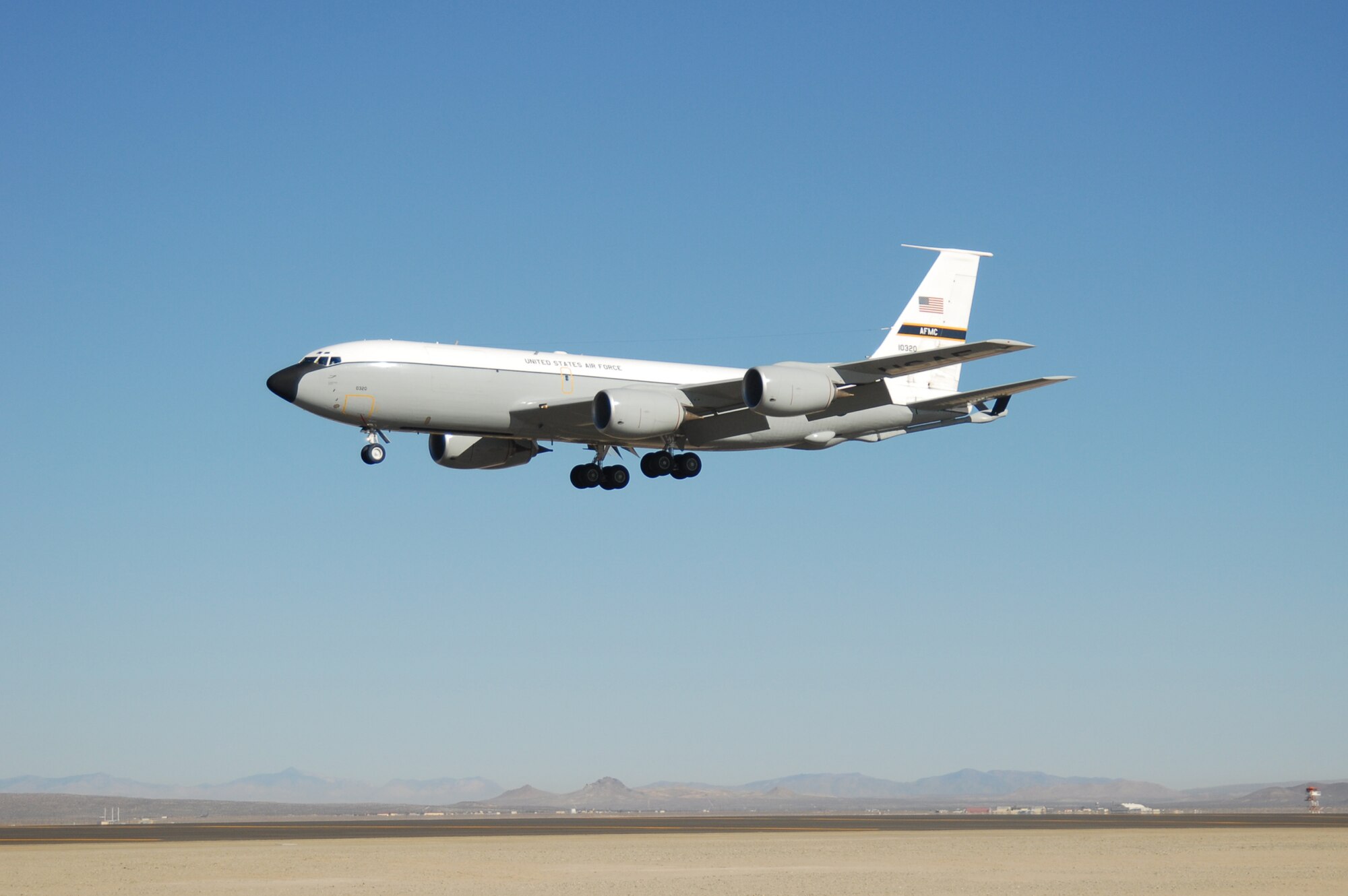 A KC-135 Stratotanker flies over Edwards after refueling an F-35 Joint Strike Fighter Oct. 23 during the F-35's completion of an air start test. (Air Force photo by Senior Airman Julius Delos Reyes)