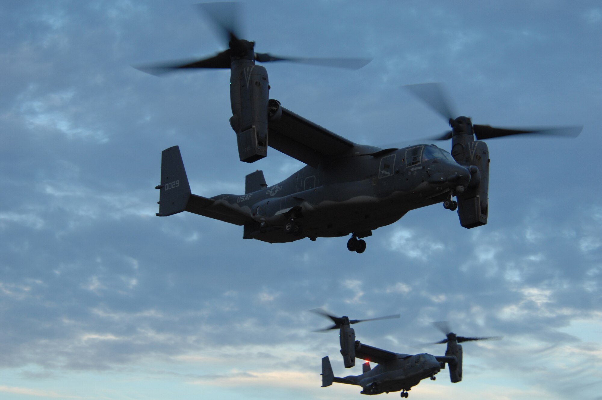 Hurlburt Field, Fla.-- CV-22 Ospreys assigned to the 8th Special Operations Squadron demonstrate their capabilities over a live firing range at Eglin Air Force Base, Fla., for congressmen Oct. 22. The exhibition provided a realistic observation opportunity of special operations forces in a combat scenario.  (U.S. Air Force photo by Senior Airman Stephanie Jacobs) 