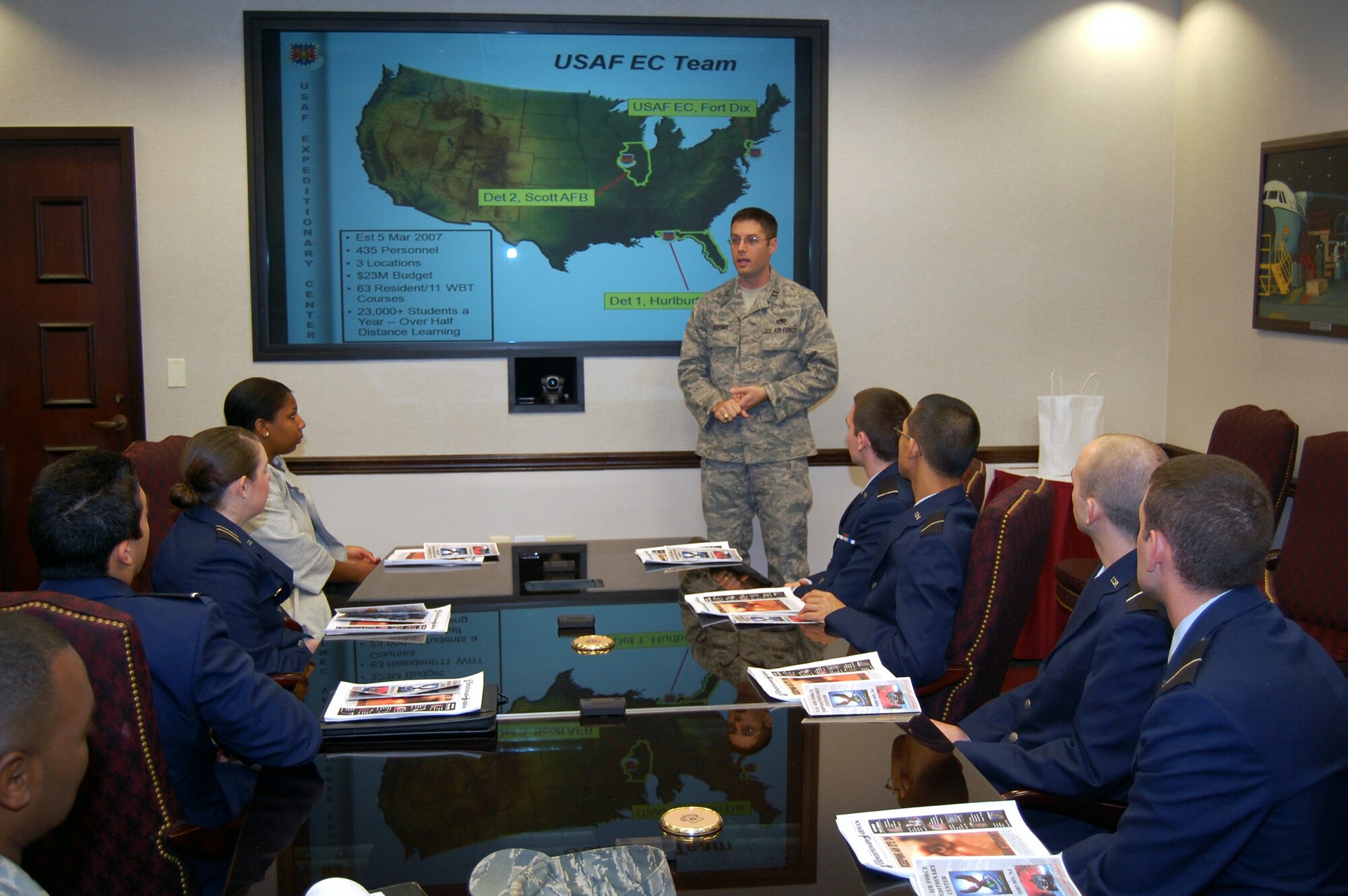 Capt. Wes Adams, executuve officer to the U.S. Air Force Expeditionary Center commander and a Reserve Officer Training Corps (ROTC) graduate, speaks with cadets from Air Force ROTC Detachment 485 of Rutgers University Oct. 23, 2008, while the cadets were visiting the center on Fort Dix, N.J..  The cadets came to the center as part of an opportunity to learn about the center's mission and training and the tour was hosted by the USAF EC Public Affairs Office.  (U.S. Air Force Photo/Tech. Sgt. Scott T. Sturkol)