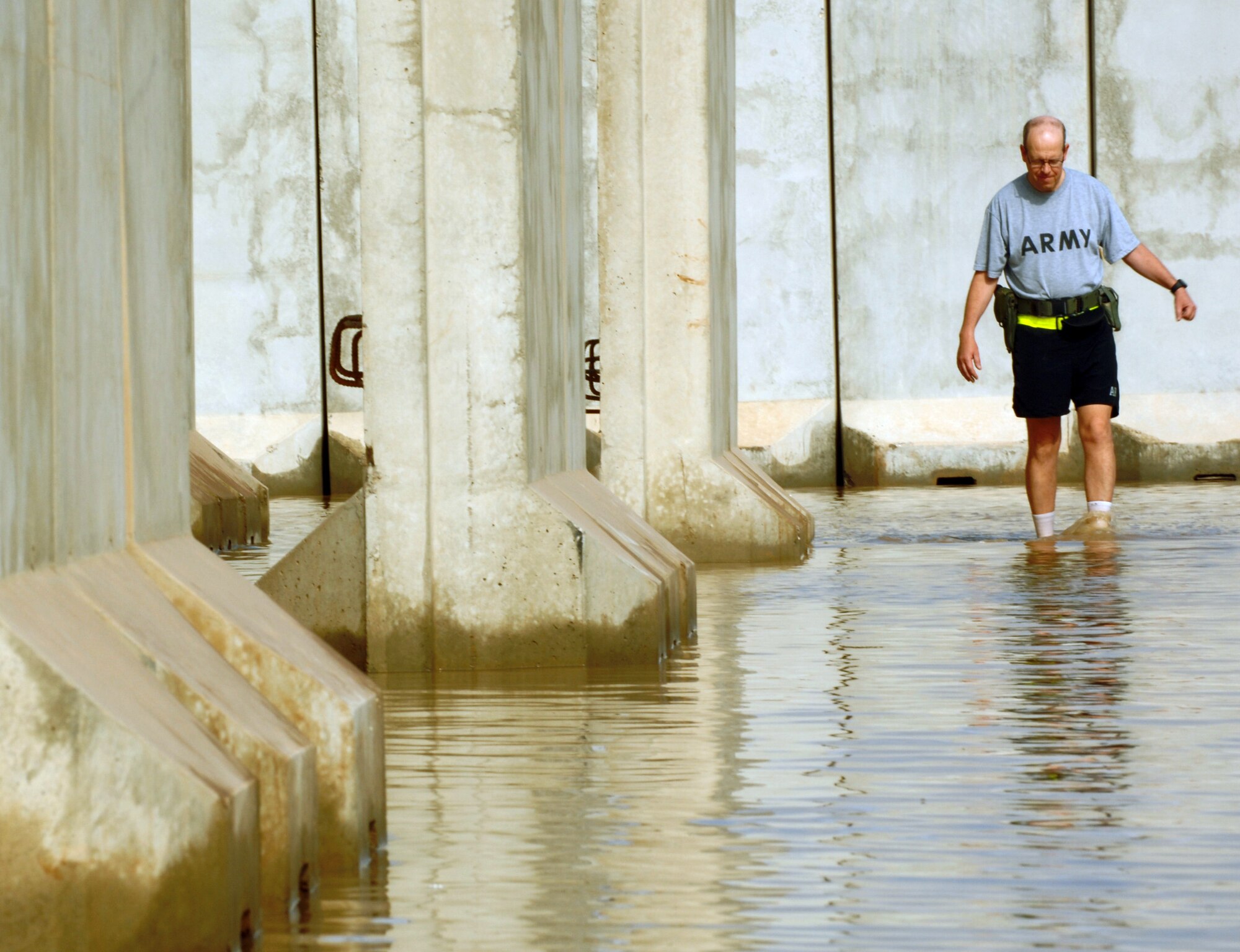 Water floods a housing area Oct. 25 at Joint Base Balad, Iraq. Because rain is infrequent in Iraq, when it does rain, the hardened ground soaks up little water. (U.S. Air Force photo/Tech. Sgt. Erik Gudmundson) 
