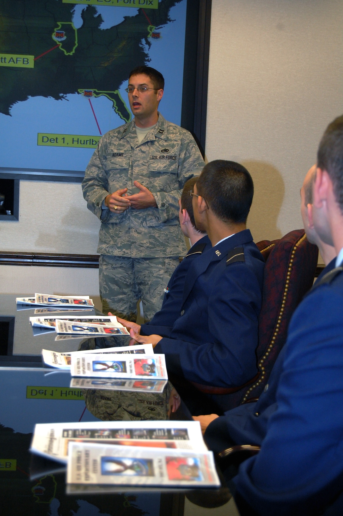 Capt. Wes Adams, executive officer to the U.S. Air Force Expeditionary Center commander and a graduate of the Reserve Officer Training Corps (ROTC), speaks with cadets from Air Force ROTC Detachment 485 of Rutgers University Oct. 23, 2008, while the cadets were visiting the center.  The cadets came to the center as part of an opportunity to learn about the center's mission and training and the tour was hosted by the USAF EC Public Affairs Office.  (U.S. Air Force Photo/Tech. Sgt. Scott T. Sturkol)