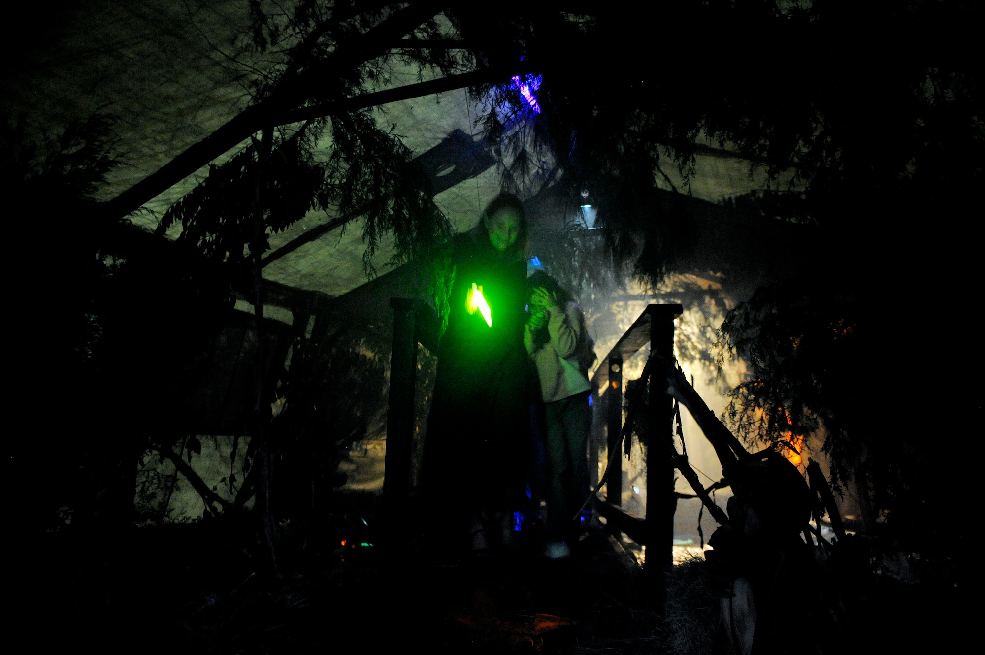 MOODY AIR FORCE BASE, Ga. – Team Moody members walk through the 23rd Civil Engineer Squadron Haunted House Oct. 25 here. The haunted house is open until Nov. 1. (U.S. Air Force photo by Senior Airman Brittany Barker) 

