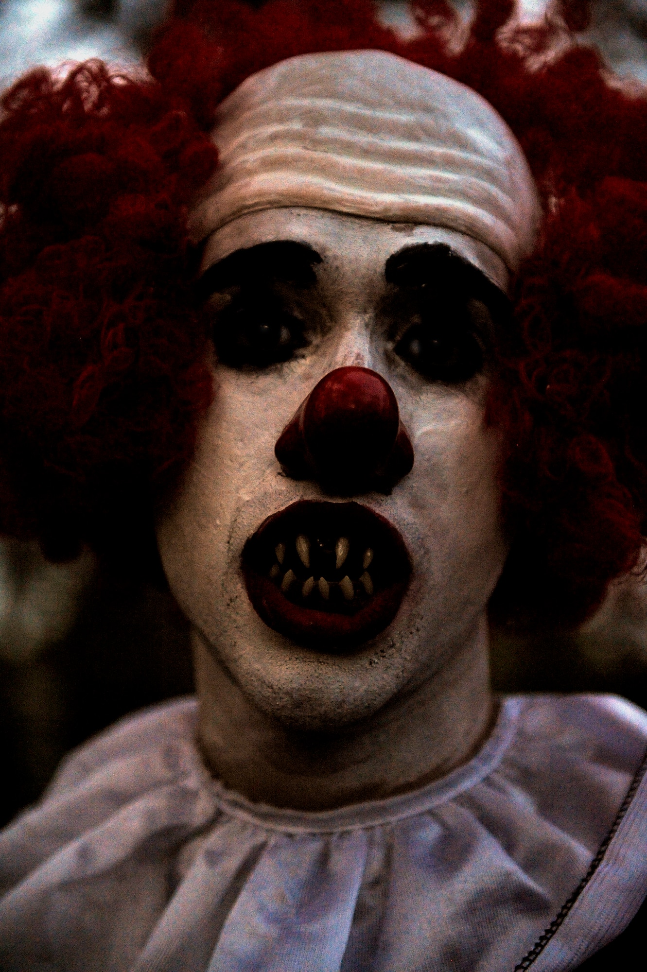 MOODY AIR FORCE BASE, Ga. – Staff Sgt. Adam Dixon, 23rd Civil Engineer Squadron member, dresses as a clown during the 23rd CES Haunted House Oct. 25 here. Moody Airmen volunteered to help run the haunted house. (U.S. Air Force photo by Senior Airman Brittany Barker) 