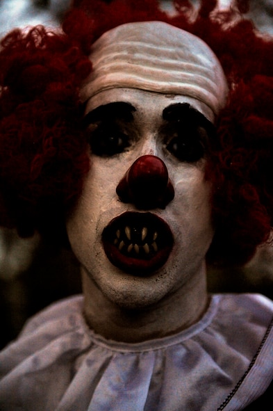 MOODY AIR FORCE BASE, Ga. – Staff Sgt. Adam Dixon, 23rd Civil Engineer Squadron member, dresses as a clown during the 23rd CES Haunted House Oct. 25 here. Moody Airmen volunteered to help run the haunted house. (U.S. Air Force photo by Senior Airman Brittany Barker) 