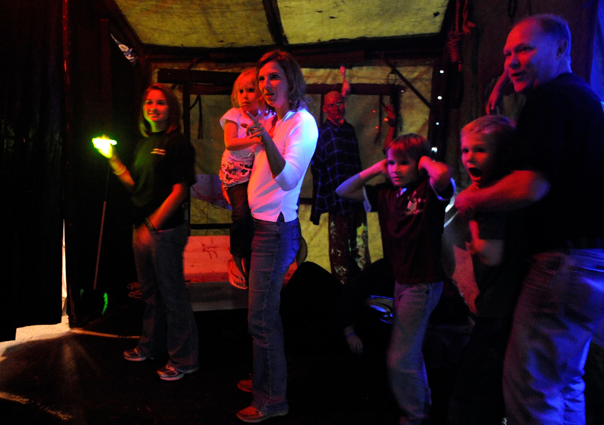MOODY AIR FORCE BASE, Ga. – Team Moody members participate in the action at the 23rd Civil Engineer Squadron Haunted House Oct. 25 here. Before dark, the haunted house does a lights-on portion for the younger crowd. (U.S. Air Force photo by Senior Airman Brittany Barker) 