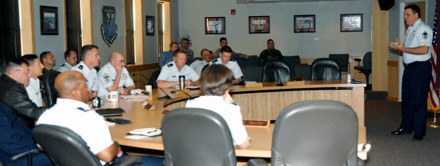 DYESS AIR FORCE BASE, Texas – Master Sgt. Shane Meister, right, provides executive-level Air Force Smart Operations-21st Century training to 7th Bomb Wing leadership in the wing conference room Oct. 27. As the base AFSO21 facilitator, Sergeant Meister is responsible for all process improvement events for Dyess. Since AFSO21 was first implemented in the 7th Maintenance Group in 2006, Dyess has created 25 Lean events and fostered a culture that constantly combats waste. (U.S. Air Force photo/Senior Airman Carolyn Viss)