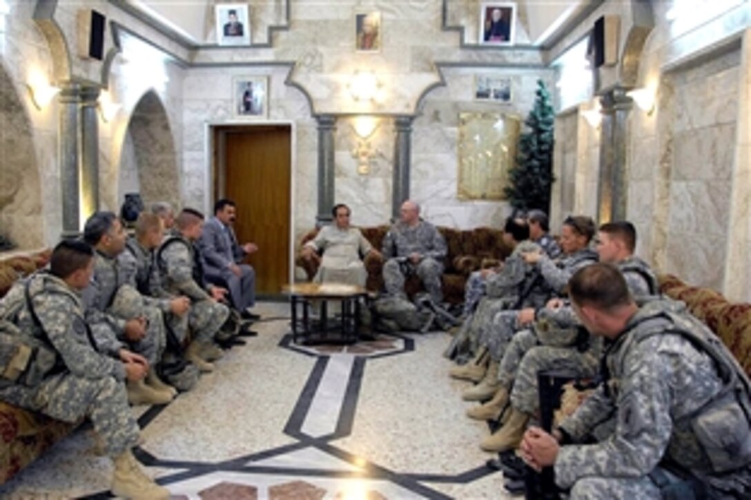 U.S. Army soldiers visit Father Abu'na Francis Lalu at St. Behnam's Monastery in Nimrud, Iraq, Oct. 15, 2008, as part of an assessment of the conditions for Christians in the area. The soldiers are assigned to the 8th Infantry Regiment's Civil Affairs Team 6, Company C, 415th Civil Affairs, 1st Battalion.