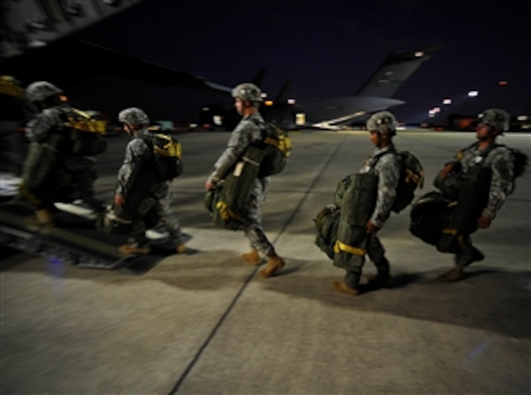 U.S. Army paratroopers from the 82nd Airborne Division, 3rd Brigade Combat Team board a C-17 Globemaster III aircraft at Pope Air Force Base, N.C., on Oct. 21 2008.  The paratroopers are conducting an airdrop in support of a joint forcible entry exercise.  The forcible entry exercise is a joint airdrop designed to enhance service cohesiveness between Army and Air Force personnel by training both services how to execute large-scale heavy equipment and troop movement.  