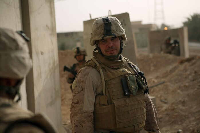 Cpl. Drew March, a fire team leader with Provisional Rifle Platoon 3, Regimental Combat Team 5, helps provide security for a camp security reinforcement  at Traffic Control Point 3 in Rawah, Iraq, Oct. 25. March is one of the infantry Marines who have added their leadership and experience to the squads within PRP-3, making the platoon a stronger unit.::r::::n::