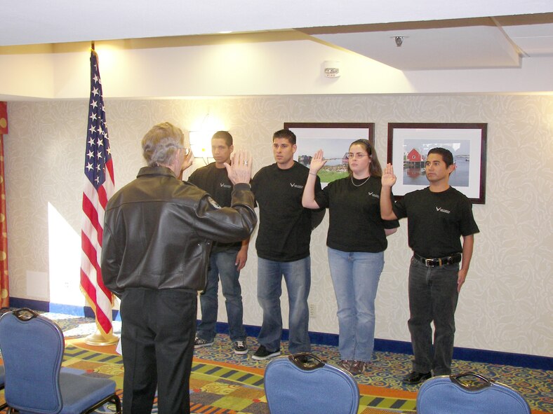 Brigadier Gen. (Ret.) Steve Ritchie swore in new reservists before the U.S. Air Force Academy football game at San Diego State University. What made this a unique event was that it was held during Navy Fleet Week. Each October, Air Force Reserve Command recruiting asks its wings to perform a mass enlistment ceremony at some unique location. (U.S. Air Force photo)