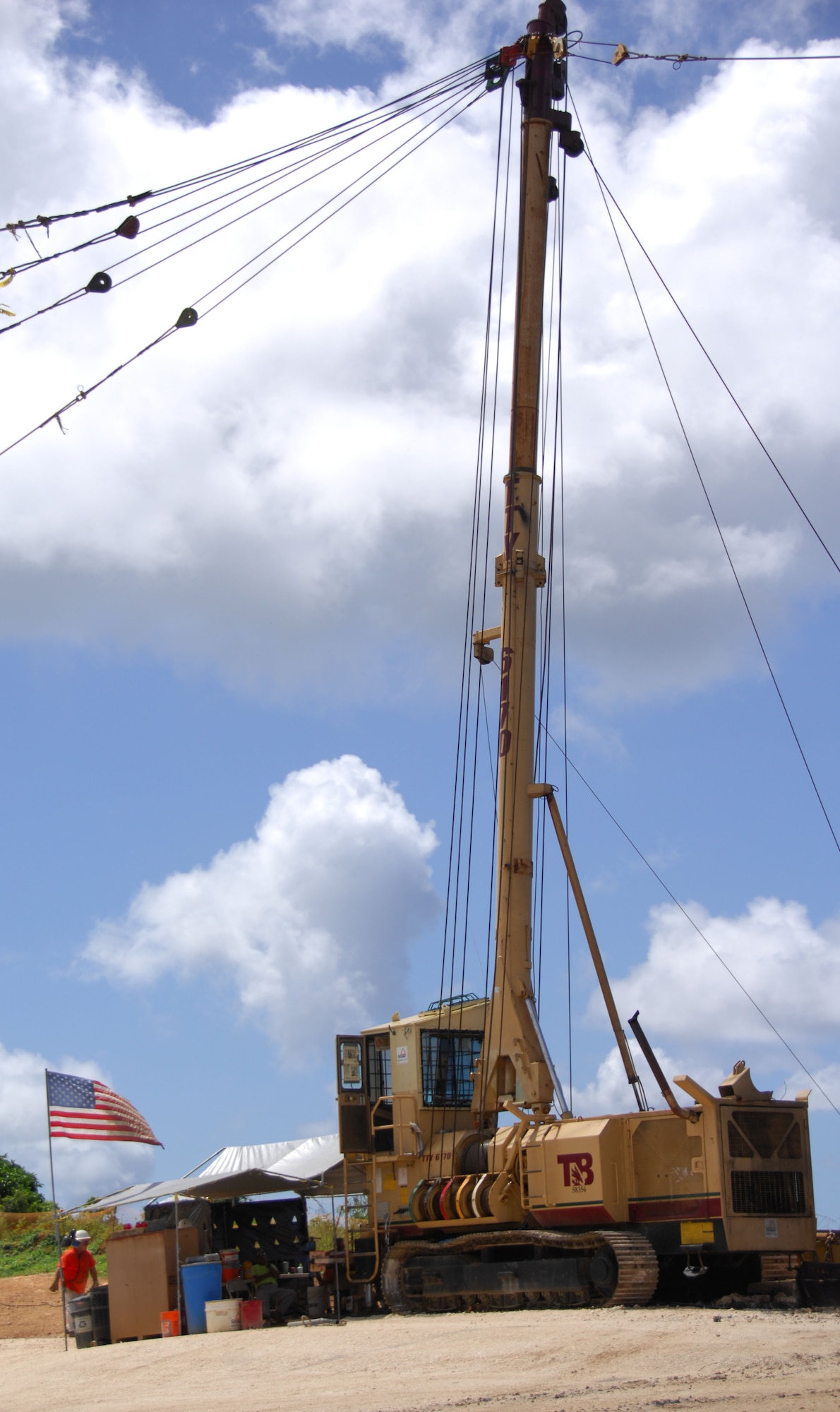 ANDERSEN AIR FORCE BASE, Guam - A skyline yarder, a piece of heavy equipment typically used by the logging industry in the Pacific Northwest, rests on the edge of the cliff at Urunao's Site 2 Oct. 28. The skyline is used to move debris out of the site to the top of the cliff. (U.S. Air Force photo by Senior Airman Shane Dunaway)