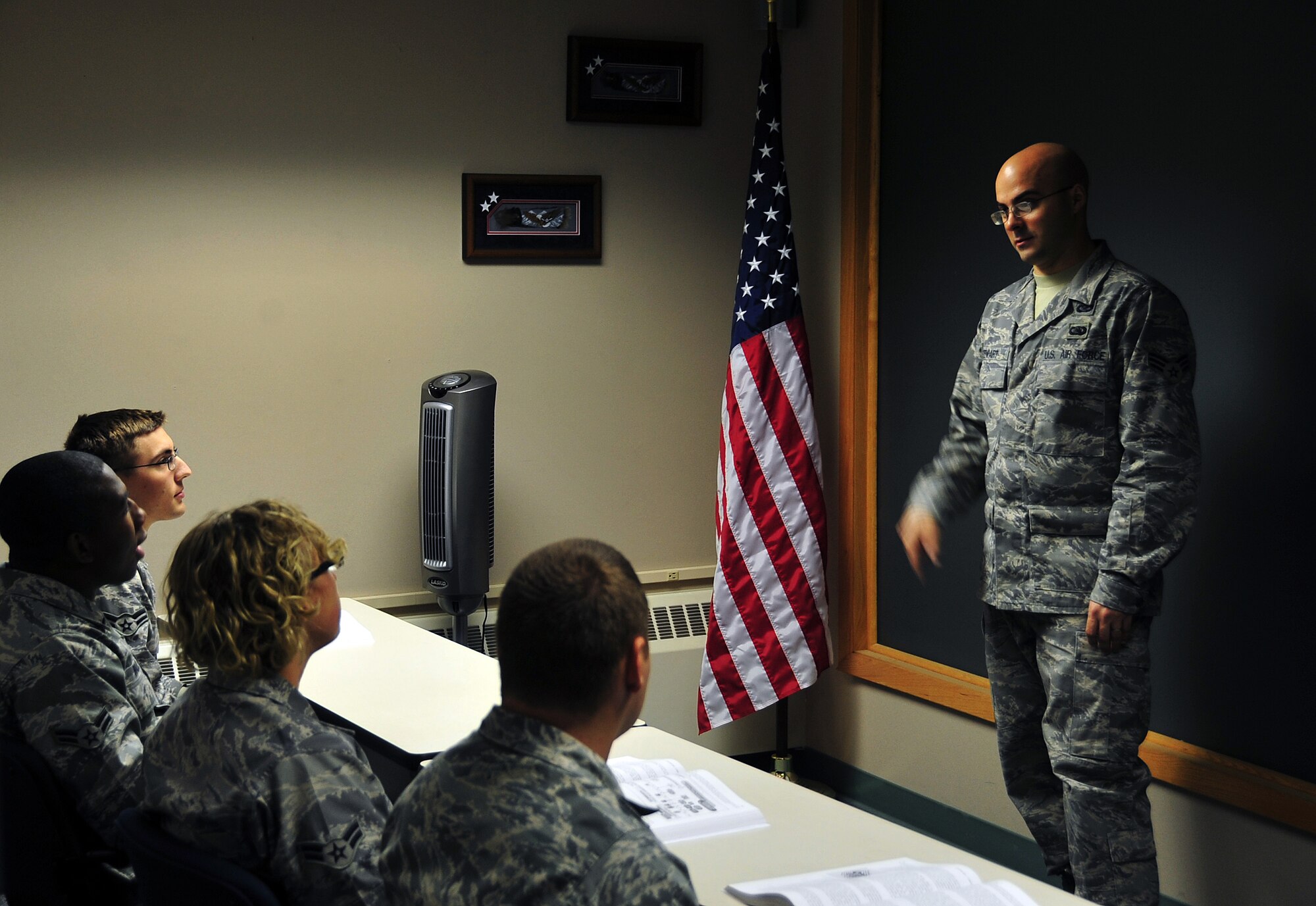 A presenter from the 354th Fighter Wing talks with some first term Airmen Oct. 28, 2008, about the benefits of the Air Force. The First Term Airmen Center brings speakers from all over Eielson Air Force Base to discuss their unit or programs and the first term Airmen provide feedback about their interests regarding the presentation. (U.S. Air Force photo by Airman 1st Class Willard E. Grande II)