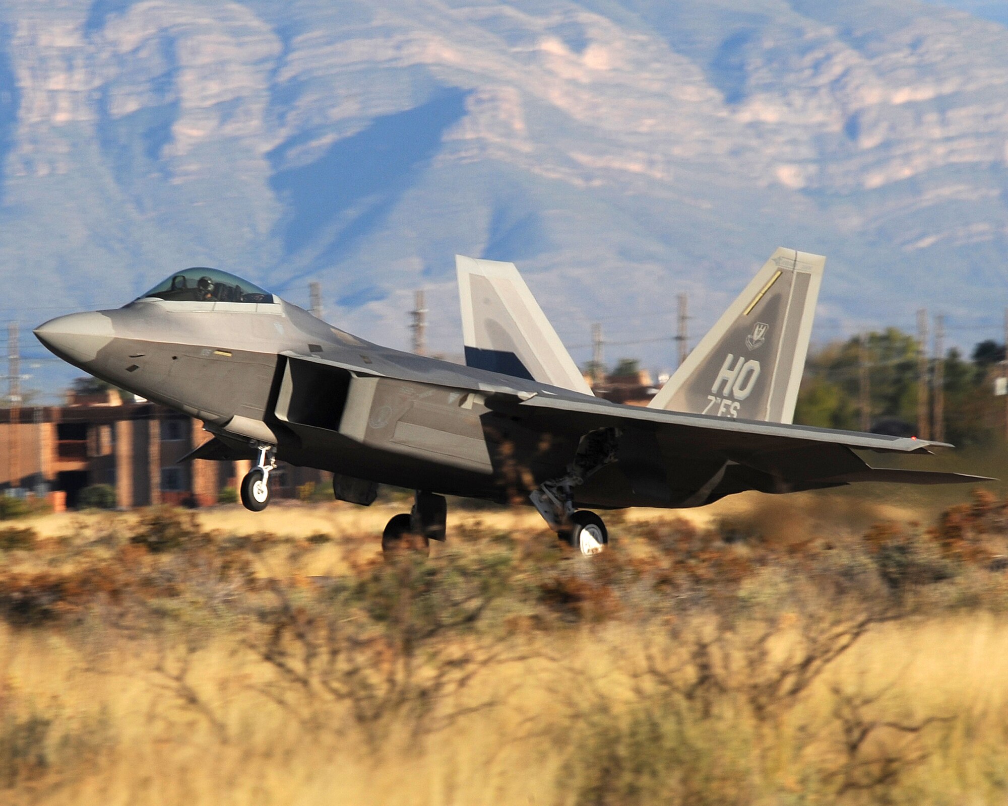 An F-22A takes off at  Holloman Air Force Base, N.M., October 22 for training missions in the local area. It is the first time Holloman launches the fleet of F-22's to test the aircraft's ability to fly two ship operations. (U.S. Air Force photo/Tech. Sgt. Chris Flahive)