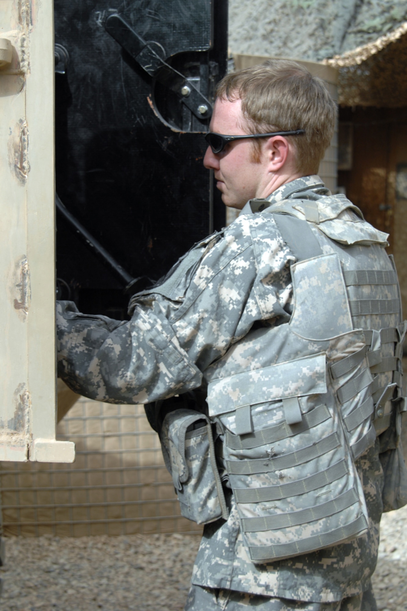 Senior Airman Aaron Skelton, 506th Air Expeditionary Group Explosive Ordnance Disposal flight journeyman, loads his equipment into a Joint EOD Rapid Response Vehicle (JERRV) Sept. 14. Airman Skelton is one of six 506th EOD Airmen forward deployed to FOB McHenry where they are embedded with soldiers of the Army’s 10th Mountain Division for route clearing duties. Airman Skelton He is deployed from Nellis Air Force Base, Nev., and calls Citrus Springs, Fla., home. (U.S. Air Force photo/Tech. Sgt. Jeff Walston)