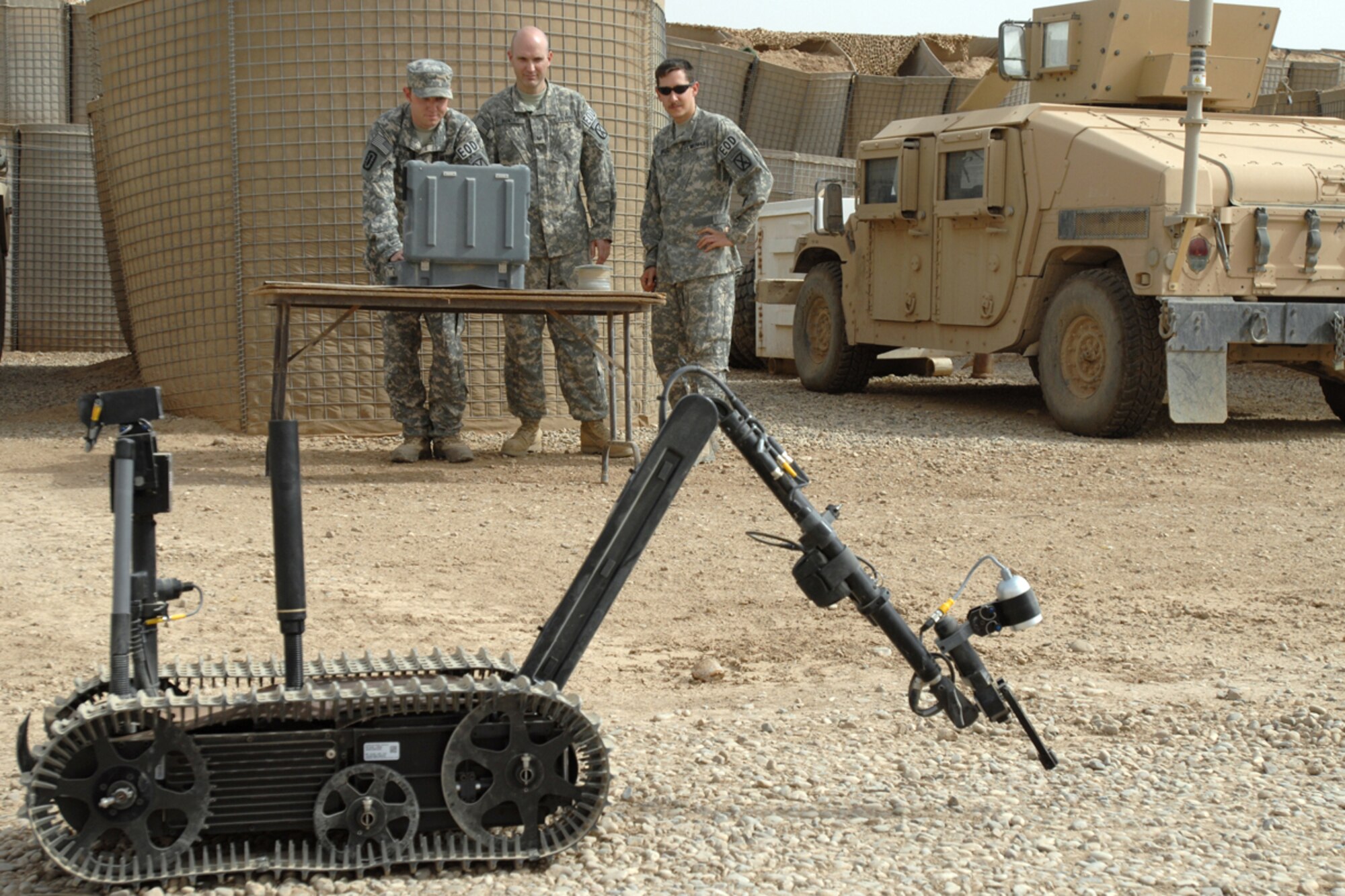 KIRKUK REGIONAL AIR BASE, Iraq – 506th Air Expeditionary Group Explosive Ordnance Disposal flight members Senior Airman Aaron Skelton, Tech. Sgt. Stephen Ray Hunter Jr. and Senior Airman Joshua Brum, run a function check on a TALON robot Sept 14. The teams use the robot to recon and disable roadside bombs. Six Kirkuk RAB EOD Airmen are forward deployed to FOB McHenry where they are embedded with soldiers of the Army’s 10th Mountain Division. (U.S. Air Force photo/Tech. Sgt. Jeff Walston)