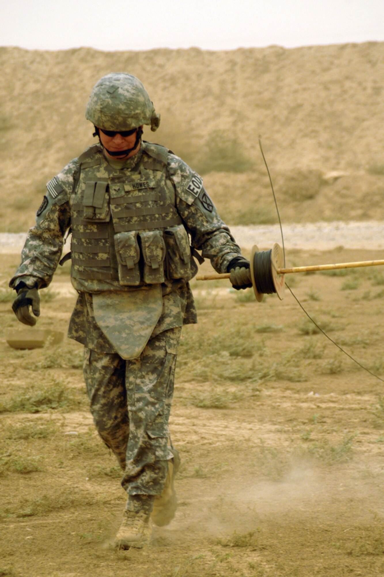 KIRKUK REGIONAL AIR BASE, Iraq – Senior Airman Jason Howes, 506th Air Expeditionary Group Explosive Ordnance Disposal flight journeyman, prepares to dispose of insurgent ordnance Sept 15. Airman Howes is one of six EOD Airmen forward deployed to FOB McHenry where they are embedded with soldiers of the Army’s 10th Mountain Division.  He is deployed from Nellis Air Force Base, Nev., and calls Jupiter, Fla., home. (U.S. Air Force photo/Tech. Sgt. Jeff Walston)