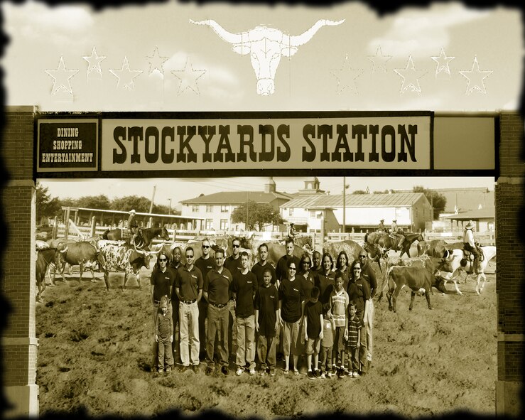 301st Fighter Wing Recruiters and their families from the Dallas/Fort Worth Metroplex area gathered for a nostalgic photo before heading out to their national conference held in Orlando, Fla. Fort Worth based group likes to be known for their down-home hospitality. (U.S. Air Force Photo Enhancement/Tech. Sgt. Julie Briden-Garcia)