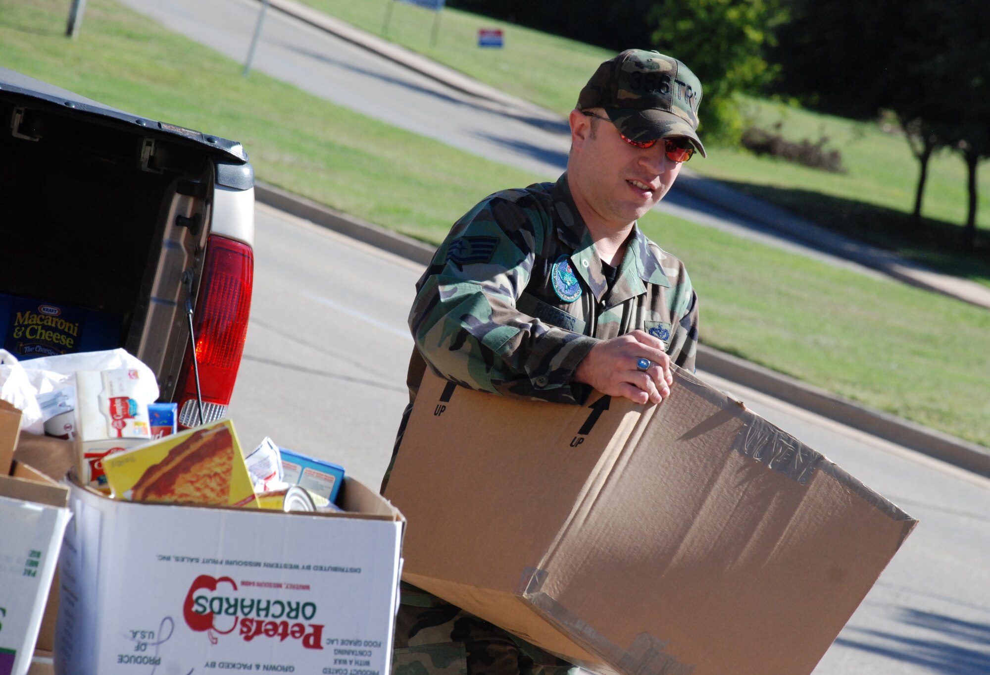 Staff Sgt. Matthew Roberts, an instructor for the 366th Training Squadron, delivers about 14,500 pounds food to the Wichita Falls Area Food Bank to be given to the less fortunate families of the local area this upcoming holiday season. Sheppard raised a total of 17, 213 pounds during the Soaring High to Feed the Hungry food drive and delivered 2,850 pounds to the Airman and Family Readiness Center. (U.S. Air Force photo/Mike McKito)