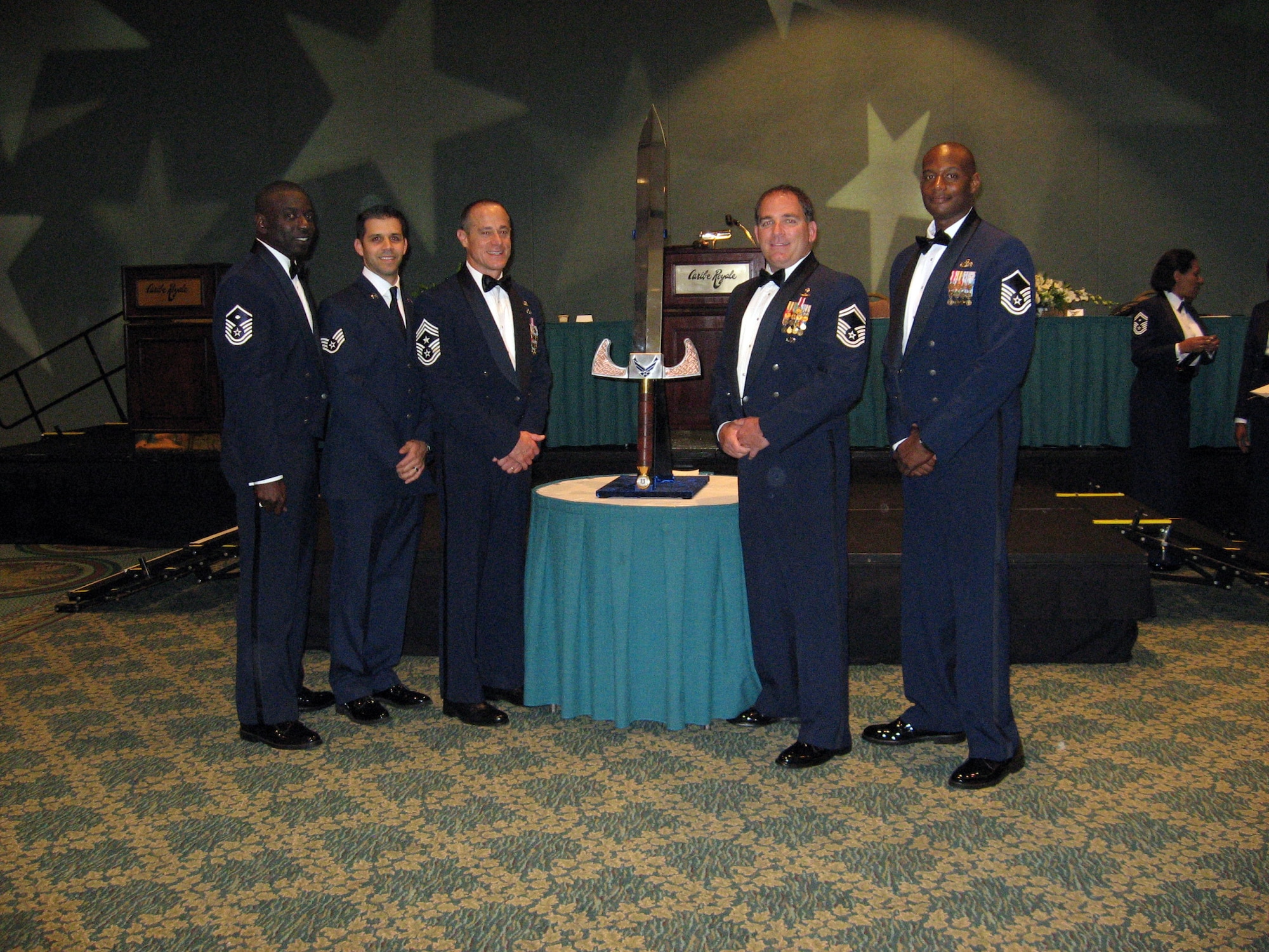 315th Airlift Wing members Master Sergeant Shaun Cunningham, Staff Sergeant Bobby Leavitt, Command Chief Master Sergeant Ben Futrell, Senior Master Sergeant Brad Levander and Master Sgt Kenneth Lewis pose for a photo on October 24, 2008 in Orlando, Fla. at the Order of the Sword induction ceremony held there.  The Order of the Sword is the highest enlisted honor in the Air Force Reserve.  Colonel Mike Mungavin (not pictured) also of the 315th AW was the recipient this year. (U.S. Air Force courtesy photo)


