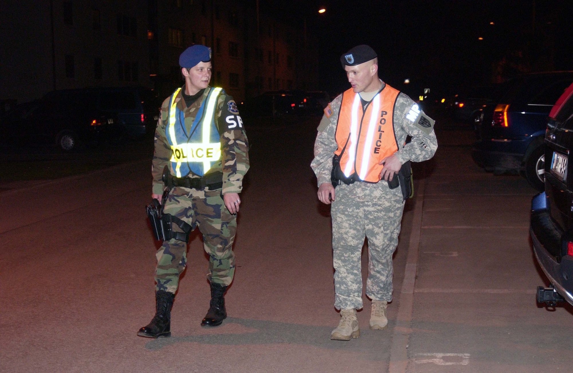 German Zivilian Police-4 Sandra Kerch, from the 569th U.S. Forces Police Squadron, and Spc. William Taylor, from the 230th Military Police Company, patrol the streets on Halloween last year in the housing area on Landstuhl Regional Medical Center. Photo by Christine June, USAG Kaiserslautern. 

                 