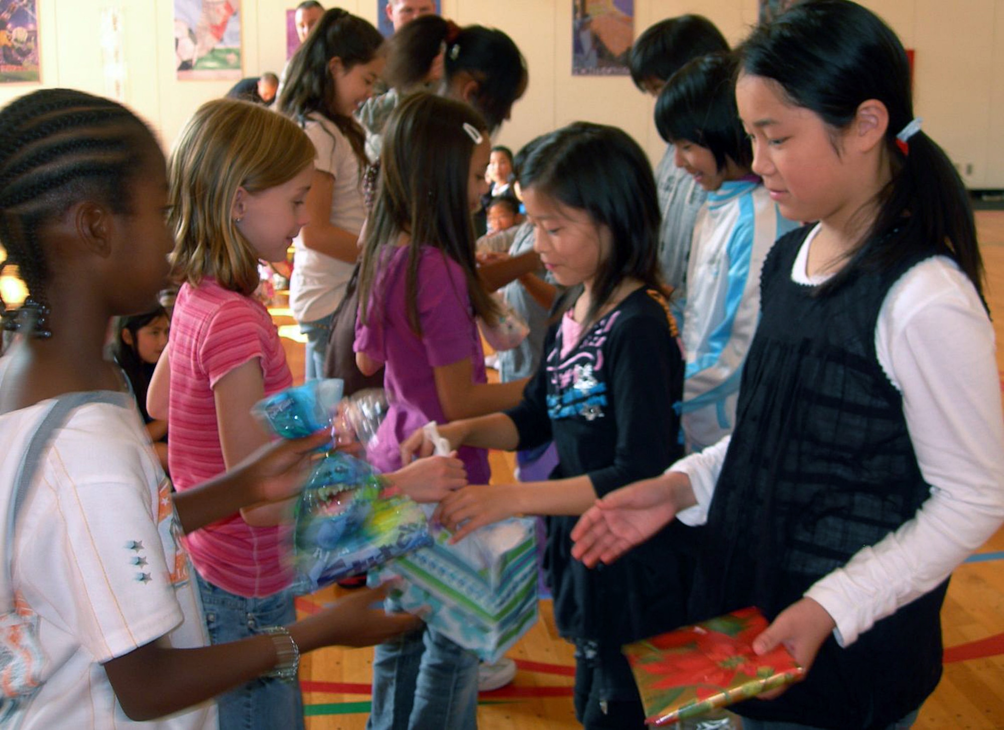 MISAWA AIR BASE, Japan -- Elementary students from Oirase Town and Misawa Air Base exchange presents during the 16th Annual Cultural Exchange Oct. 18, 2008. (Courtesy photo by Simon Bernard )
