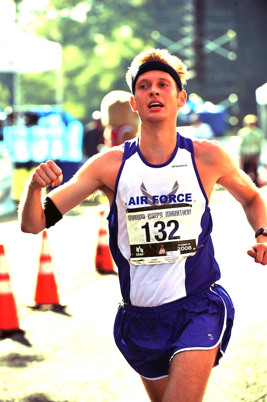 U.S. Air Force 1st Lt. Brian Dumm, normally stationed on Molesworth Air Force Base, England, finishes fifth overall with a time of 2 hours, 25 minutes, 58 seconds in the 33rd Marine Corps Marathon in Washington, D.C., Oct. 26, 2008. Dumm was first across the finish line for the All-Air Force team and the second men's finisher in the Armed Forces Marathon Championships. His brother, Andrew Dumm, won the open men's division in 2:22:42.
