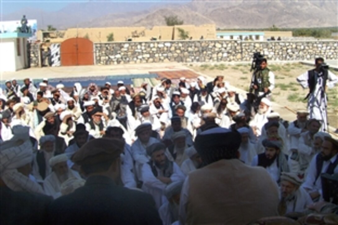 About 250 local village elders attended a tribal conference, known as a jirga, at the Tagab District Center, Afghanistan, Oct. 26, 2008, that was initiated by the Kapisa and Parwan Provincial Reconstruction Teams, the U.N. Assistance Mission in Afghanistan, and area government officials to foster discussion about area problems and solutions.