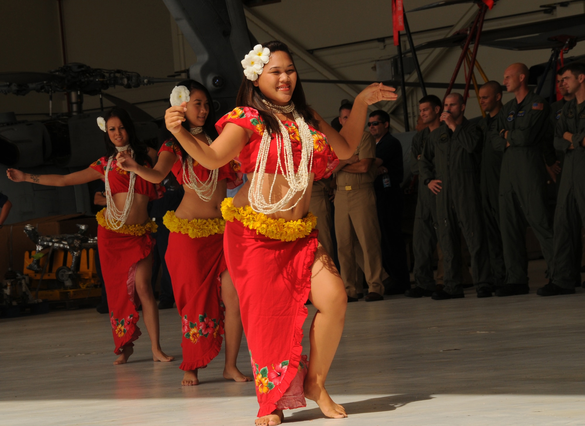 ANDERSEN AIR FORCE BASE, Guam – Cultural dancers called “Chamorritas” welcome Sailors from Helicopter Sea Combat Twenty-Five Detachment 1 home Oct. 29 here.  The dancers were just one part of the welcome the sailors received after arriving home following a nine-month deployment.  (U.S. Air Force photo by Staff Sgt. Jamie Lessard)