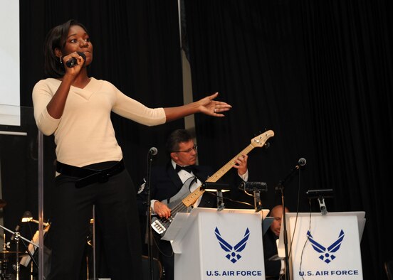 SCOTT AIR FORCE BASE, Ill. -- Airman 1st Class Ruth Rogers, 22nd Logistic Readiness Squadron, performs “Hero” by Maria Carey, during the Air Mobility Command Icon command performance, Oct. 23.  (photo by Senior Airman Jonathan Lovelady, 375th Airlift Wing Public Affairs)