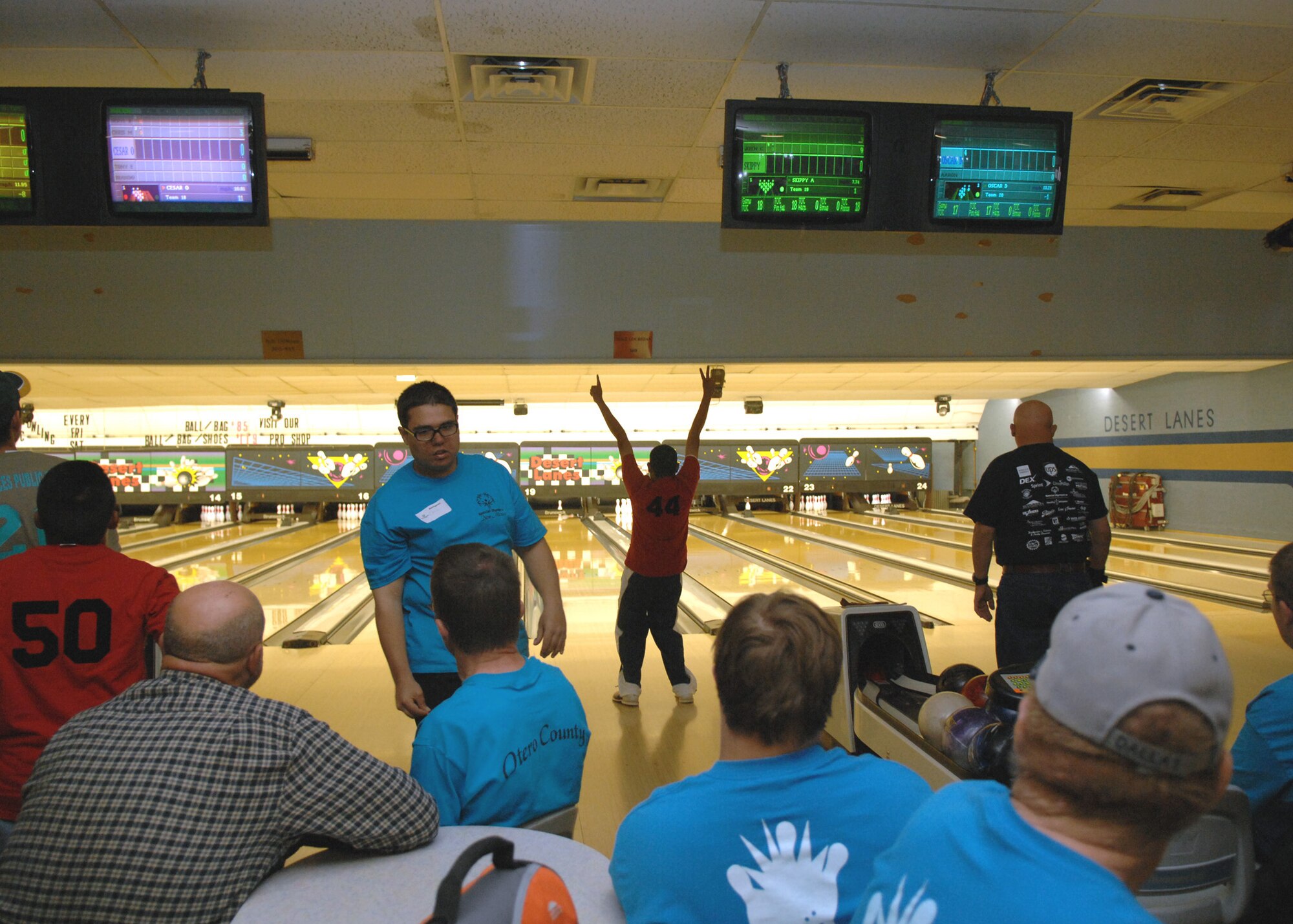 A player celebrates after knocking down pins during the bowling portion of the annual Special Olympics, held at Holloman Air Force Base, N.M., October 24. (U.S. Air Force photo/Airman 1st Class Veronica Salgado)