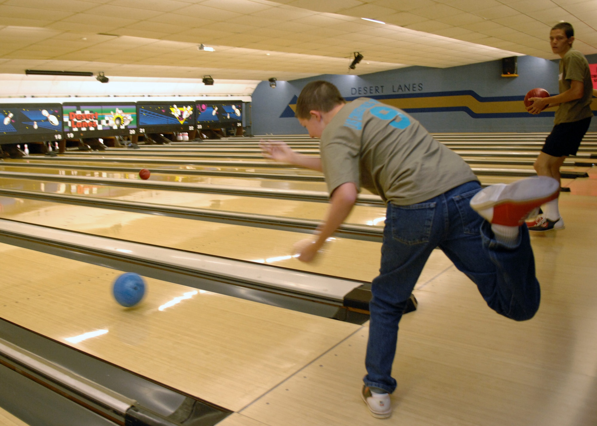 A player from Las Cruces Public School bowls during the Special Olympics bowling competition at Holloman Air Force Base, N.M., October 24. Teams from Las Cruces, N.M., competed against teams from Otero County at the Desert Lanes bowling alley. (U.S. Air Force photo/Airman 1st Class Veronica Salgado)