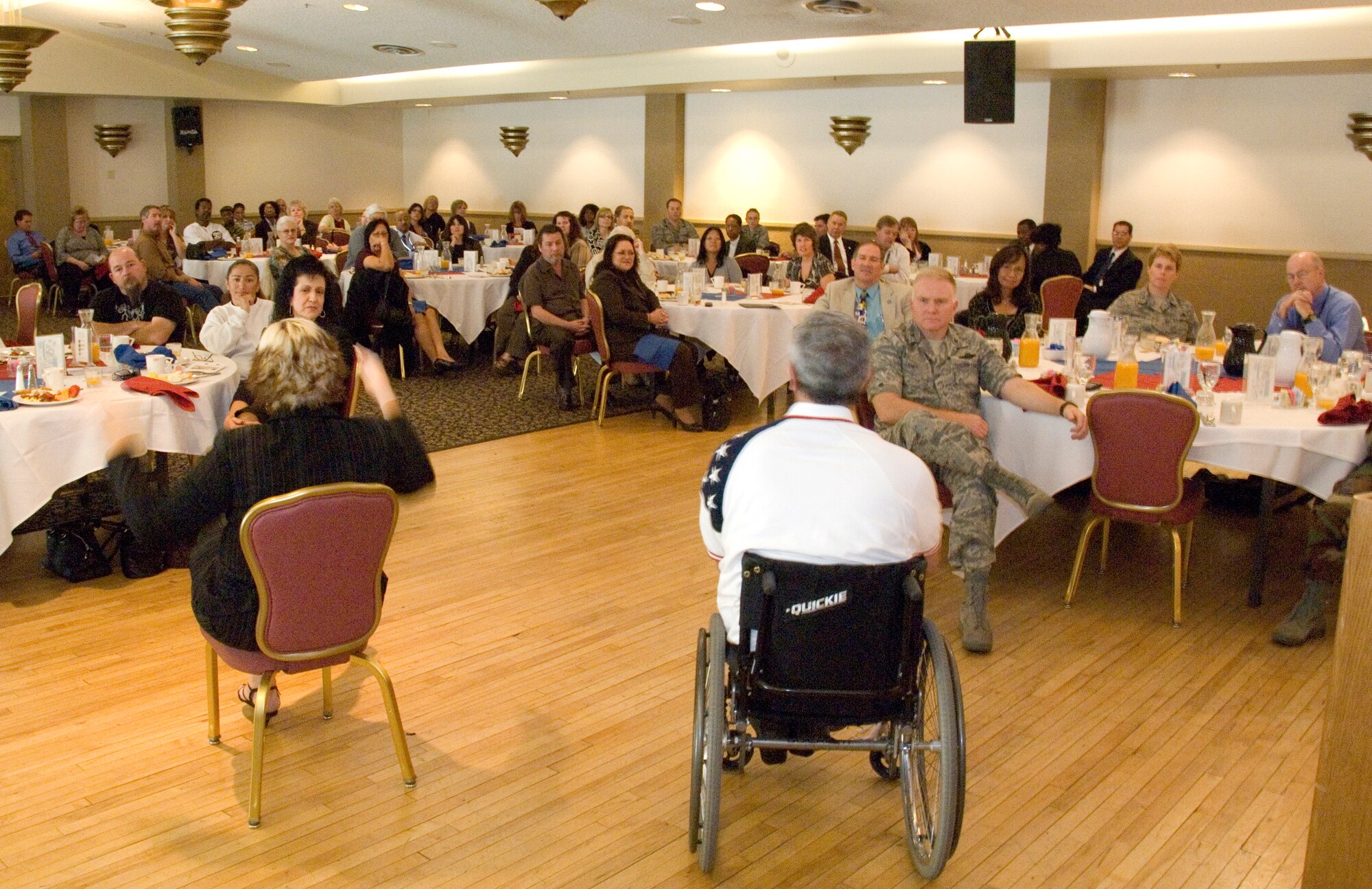 Joe Velasquez, speaks to the attendants of the National Disability Employment Awareness Month bruncheon Oct 23. Mr. Velasquez discussed what he went through after becoming disabled and gave advice about how to overcome disabilities.(NASA photo by Thomas Tschida)