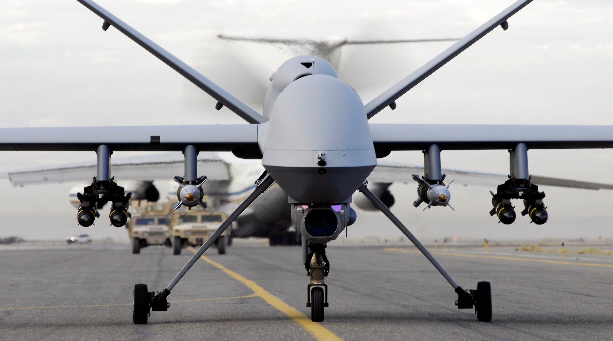 A fully armed MQ-9 Reaper taxis down a runway in Southwest Asia.  The Reaper's primary mission is as a persistent hunter-killer against emerging targets. (U.S. Air Force photo/Staff Sgt. Brian Ferguson)