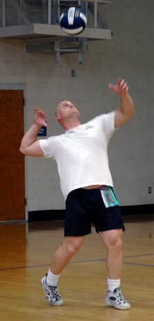 Marc Disbrow serves for AMXS to the APS team during the volleyball championship match on base Oct. 23. The AMXS team defeated APS 24-26, 25-16 and 15-10 to win the championship. Disbrow is with the 437th Aircraft Maintenance Squadron. (U.S. Air Force photo/Airman 1st Class Katie Gieratz) 