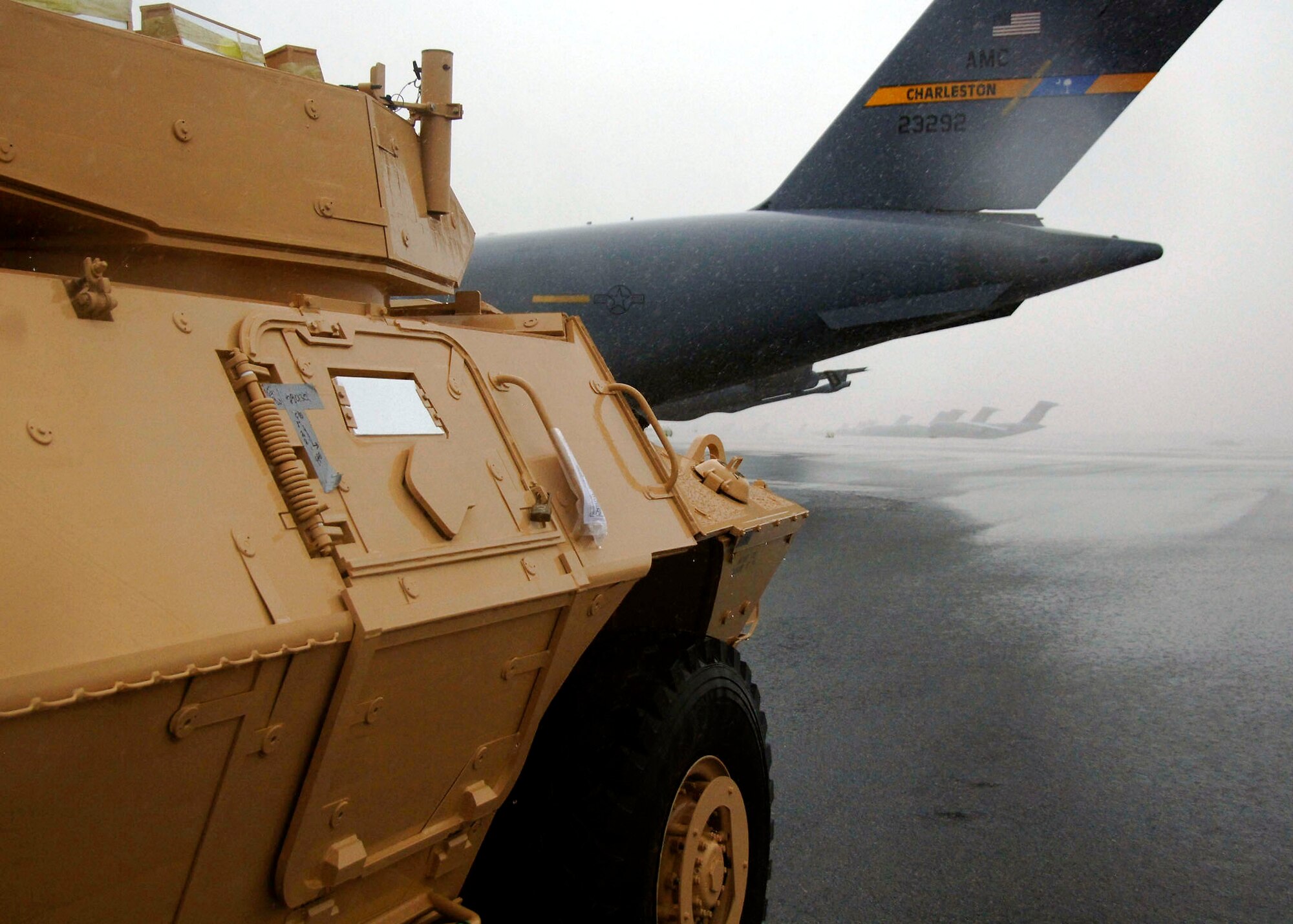 An armored security vehicle awaits to be loaded onto a C-17 Globemaster III Oct. 24 at Charleston Air Force Base, S.C. Charleston AFB officials airlifted 82 ASVs by C-17s and other Air Force aircraft to assist Soldiers in forward deployed locations. (U.S. Air Force photo/Airman 1st Class Timothy Taylor) 


