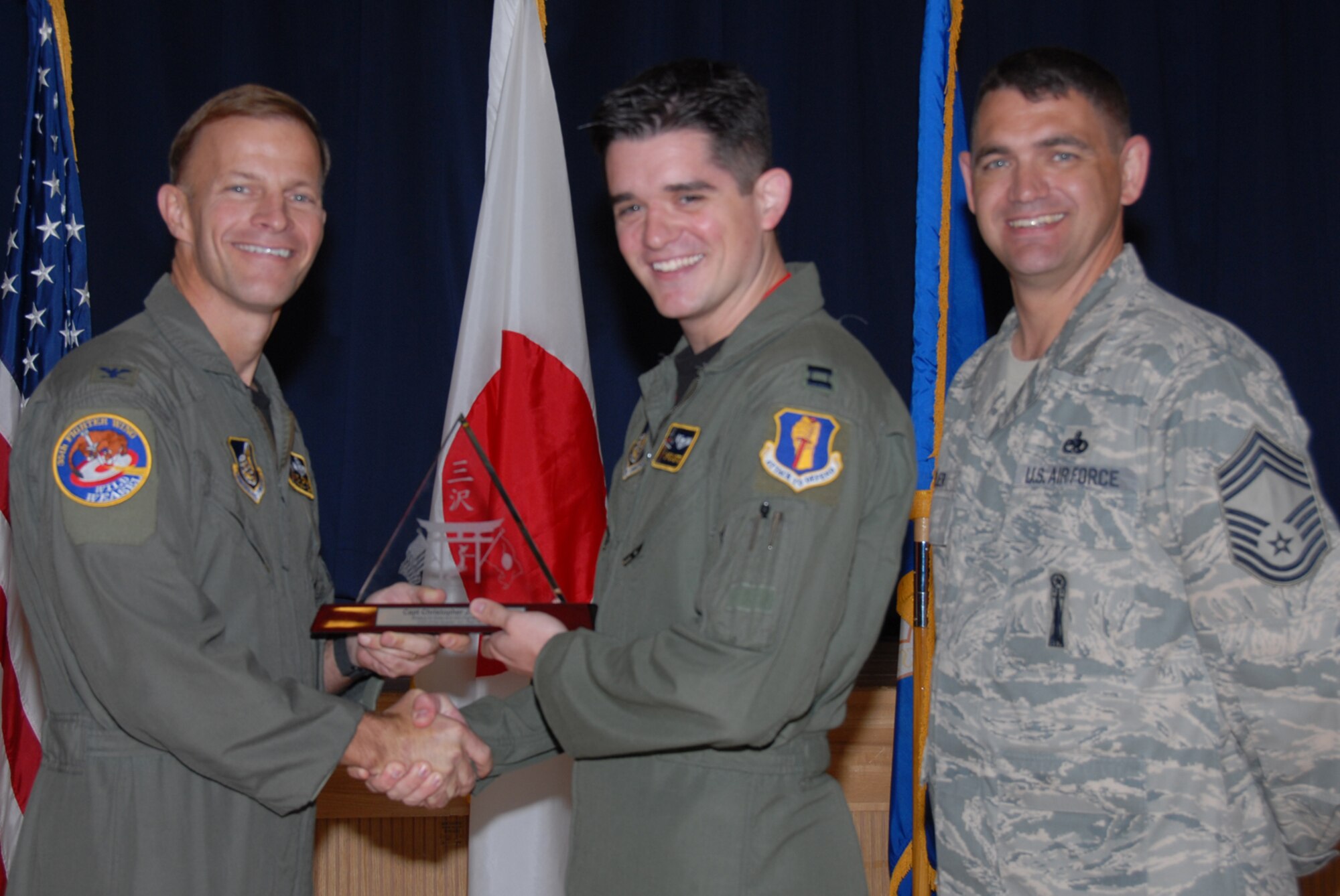 MISAWA AIR BASE, Japan -- Capt. Christopher Morton, 35th Fighter Wing, receives 35th FW CGO of the Quarter during the wing quarterly award luncheon Oct. 24, 2008. Captain Morton is a native of Emmett, Idaho, and has been in the Air Force for more than five years. (U.S. Air Force photo by Senior Airman Laura R. McFarlane) 
