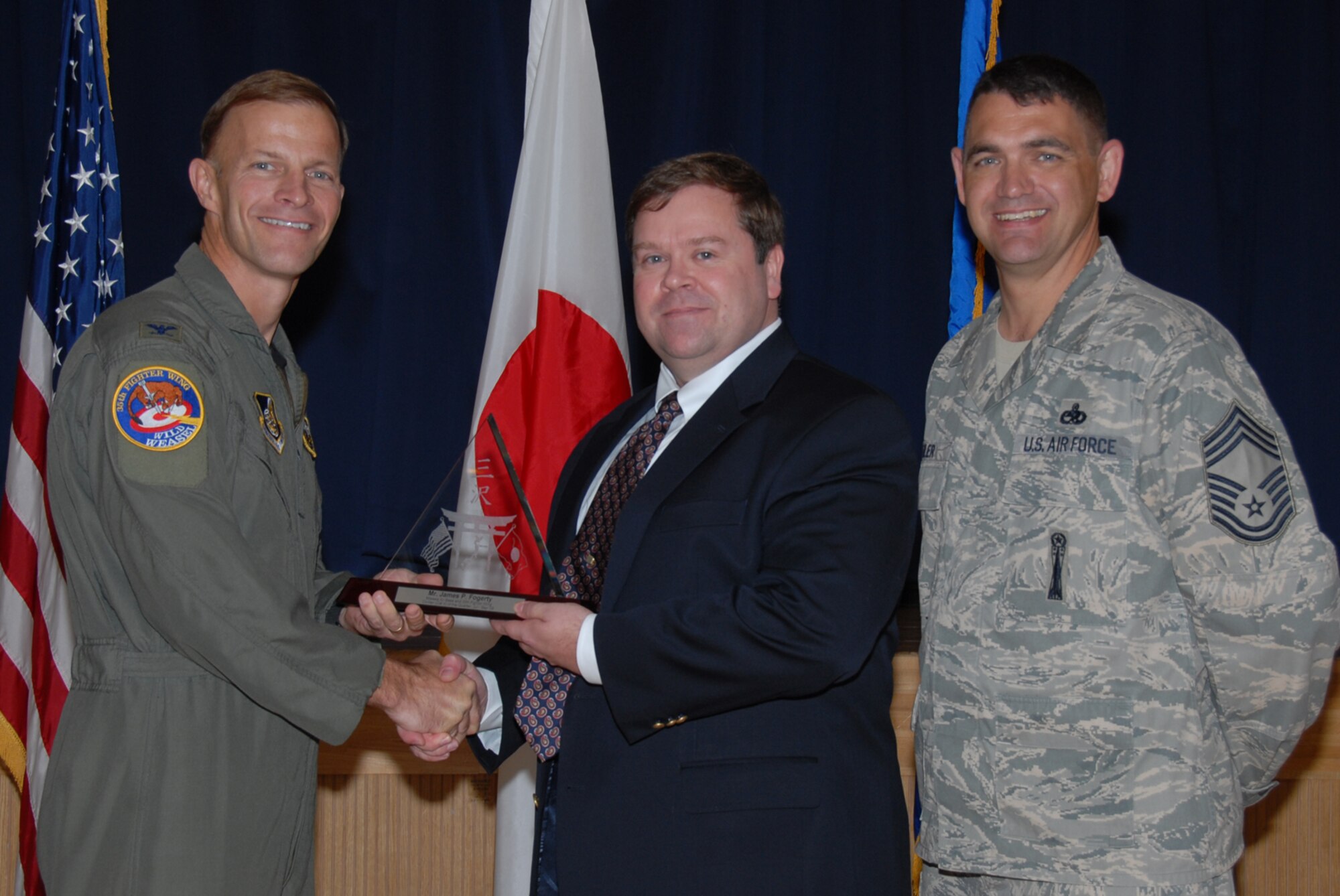 MISAWA AIR BASE, Japan -- James Fogerty, 35th Fighter Wing, receives 35th FW Civilian of the Quarter Category 2 during the wing quarterly award luncheon Oct. 24, 2008. Mr. Fogerty is a native of Bloomfield, Conn., and has worked at Misawa for two years. (U.S. Air Force photo by Senior Airman Laura R. McFarlane) 