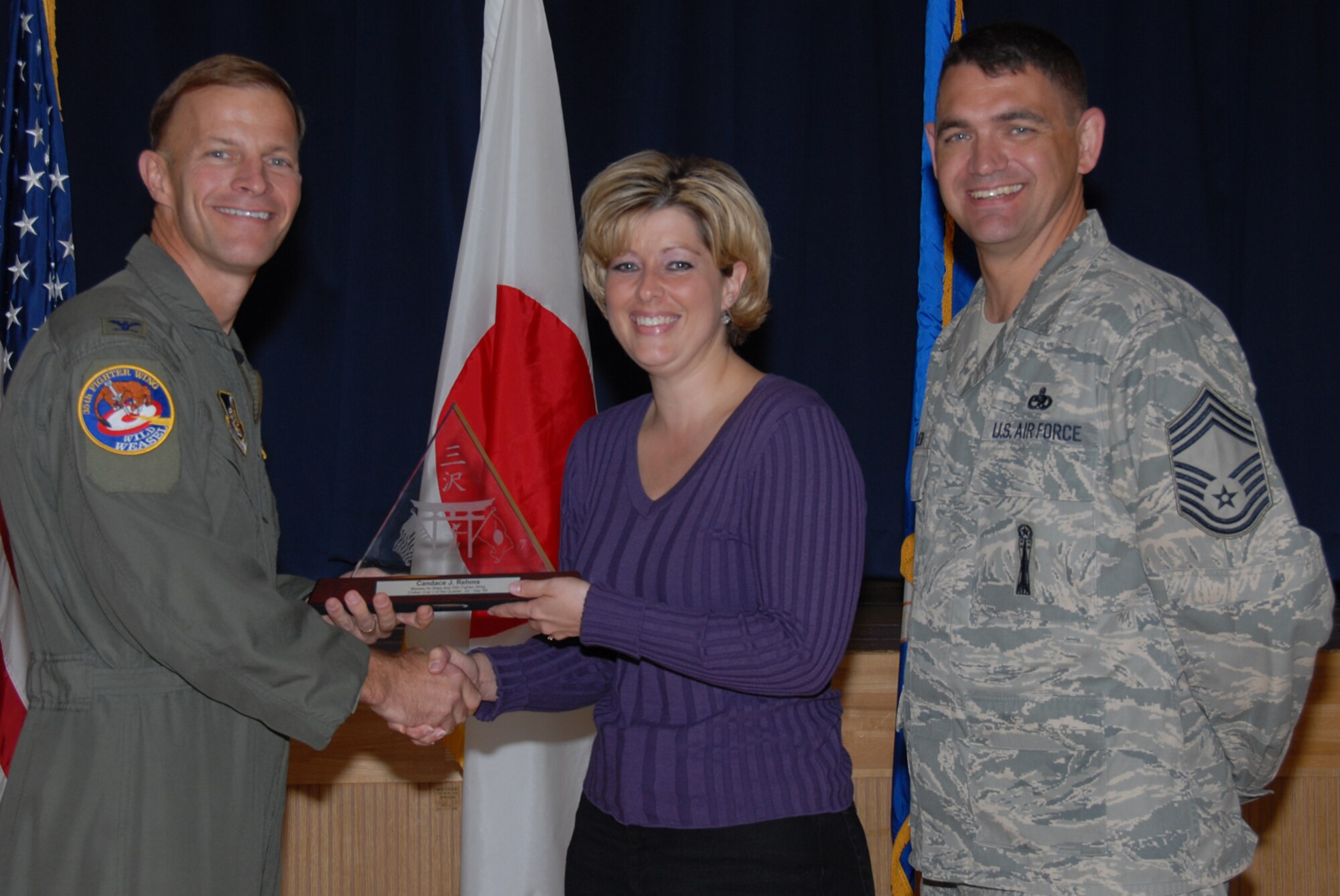 MISAWA AIR BASE, Japan -- Candace Rehms, 35th Maintenance Squadron, receives 35th Fighter Wing Civilian of the Quarter Category 1 during the wing quarterly award luncheon Oct. 24, 2008. Ms. Rehms is a native of Moscow, Idaho, and has worked at Misawa for more than two years. (U.S. Air Force photo by Senior Airman Laura R. McFarlane)  