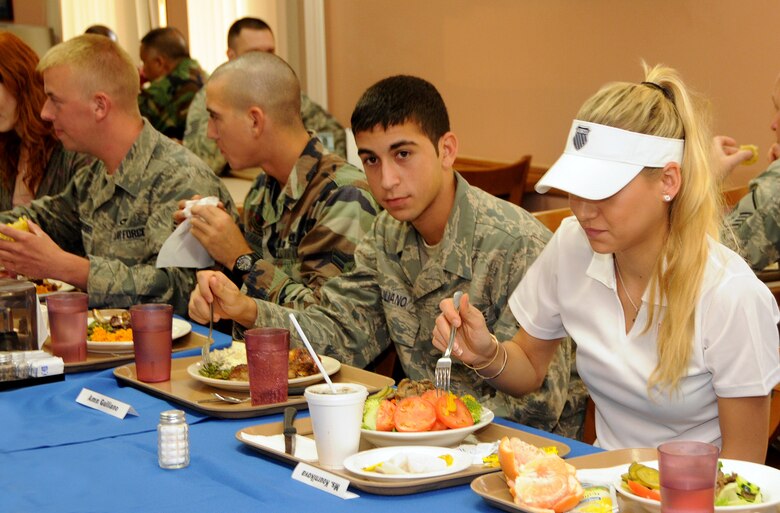 ANDERSEN AIR FORCE BASE, Guam - Anna Kournikova dines in with Airman from across the base at the Magellan Inn here Oct. 29. Ms. Kournikova signed autographs along with a photo opportunity after the meal. She is here on a tour sponsored by the USO to boost moral of the military members on Guam. (U.S. Air Force photo by Airman 1st Class Courtney Witt)
