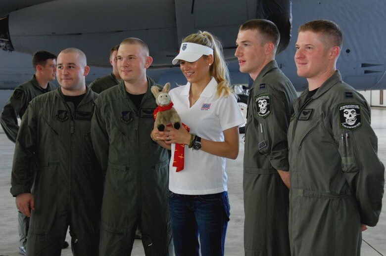 ANDERSEN AIR FORCE BASE, Guam - Anna Kournikova poses with members of the 23d Expeditionary Bomb Squadron and their mascot, "Punch", here Oct. 29 at Hangar 1. The 23d EBS is deployed here from Minot Air Force Base, North Dakota. (U.S. Air Force photo by Airman 1st Class Nichelle Griffiths)