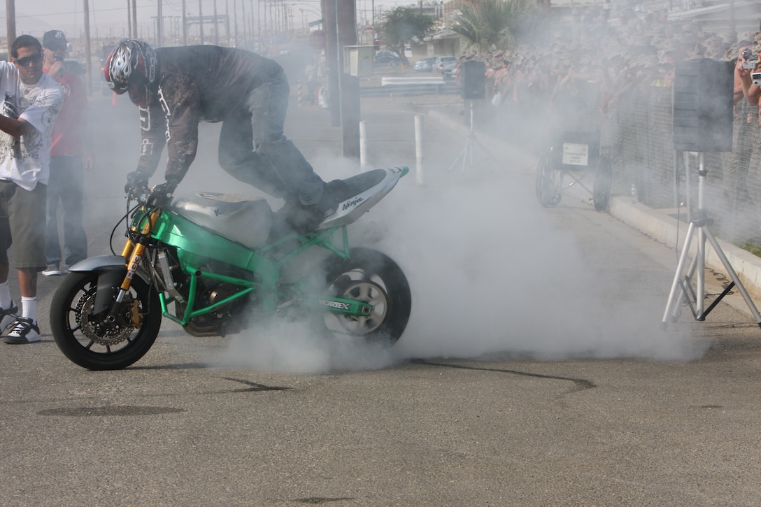 “Crazy” Kyle Rapport smokes his tires right in-front of the crowd at the Marine Corps Communications-Electronics School’s 2nd Safety Fair.  MCCES held the fair at the Combat Center’s Victory Field Oct. 30 to promote safety training and entertain the attendees.