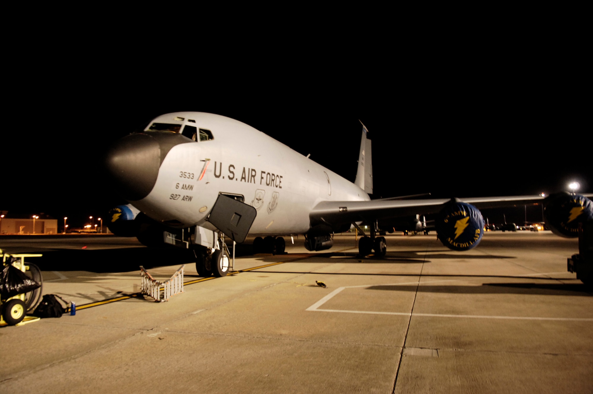 A KC-135 Startotanker sits on the ramp at MacDill Air Force Base early Oct. 28. Though much of the base sleeps during the early hours, select members of Team MacDill ensure the mission gets done through the night. These are the members who work the graveyard shift. (U.S. Air Force photo by Staff Sgt. Patrice Clarke)