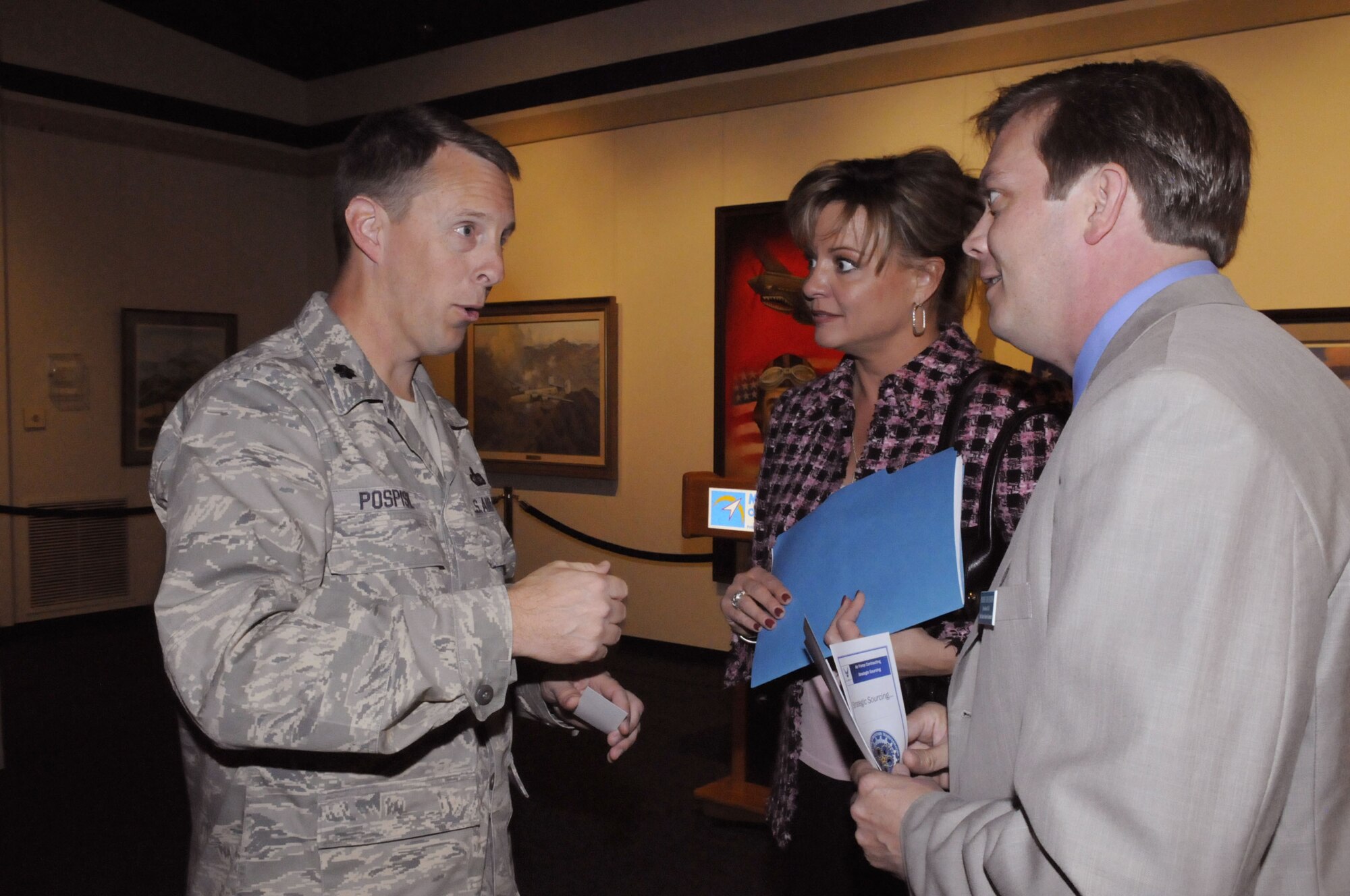 Lt. Col Todd Pospisil, 787th Installation Acquisition Group director, talks with MaryTherese Tebbe, 21st Century Partnership executive director and Perry Swanson, Peach County Chamber of Commerce president/CEO, about strategic sourcing and  future jobs. U. S. Air Force photo by Sue Sapp