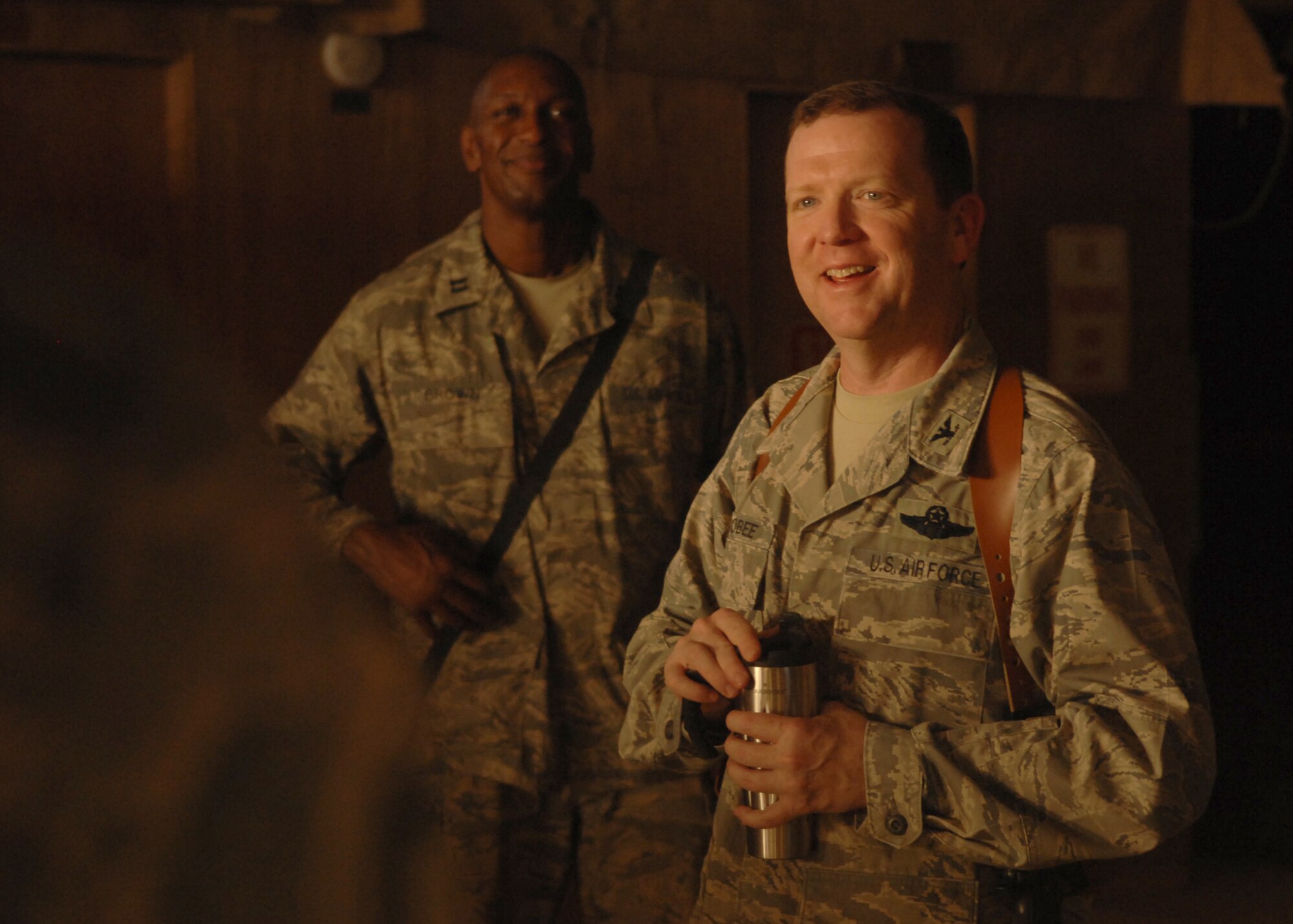 Col. Richard Scobee speaks to Airmen assigned to the 506th Expeditionary Civil Engineer Squadron at Kirkuk Regional Air Base, Iraq, Oct. 16. A traditional reservist, Colonel Scobee, relinquished command of the 506th Air Expeditionary Group Oct. 30. He returns to Luke Air Force Base, Ariz., to command Air Force Reserve Command's 944th Fighter Wing. (U.S. Air Force photo /Senior Airman Randi Flaugh)