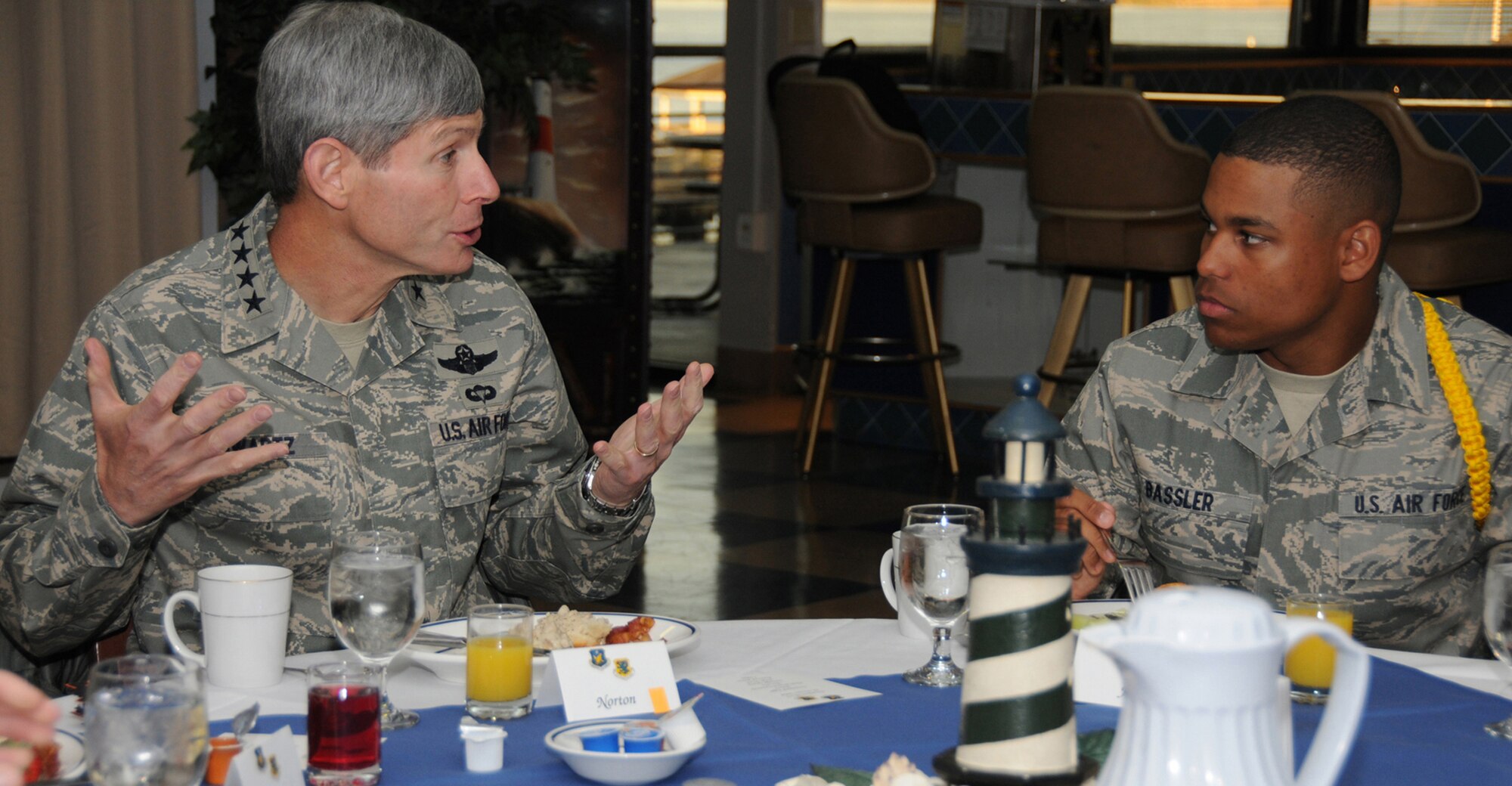 General Schwartz chats with Airman Basic John Bassler, a student leader in the 334th Training Squadron, at a breakfast at the Katrina Kantina before the general’s departure Oct. 29.  (U.S. Air Force photo by Kemberly Groue)