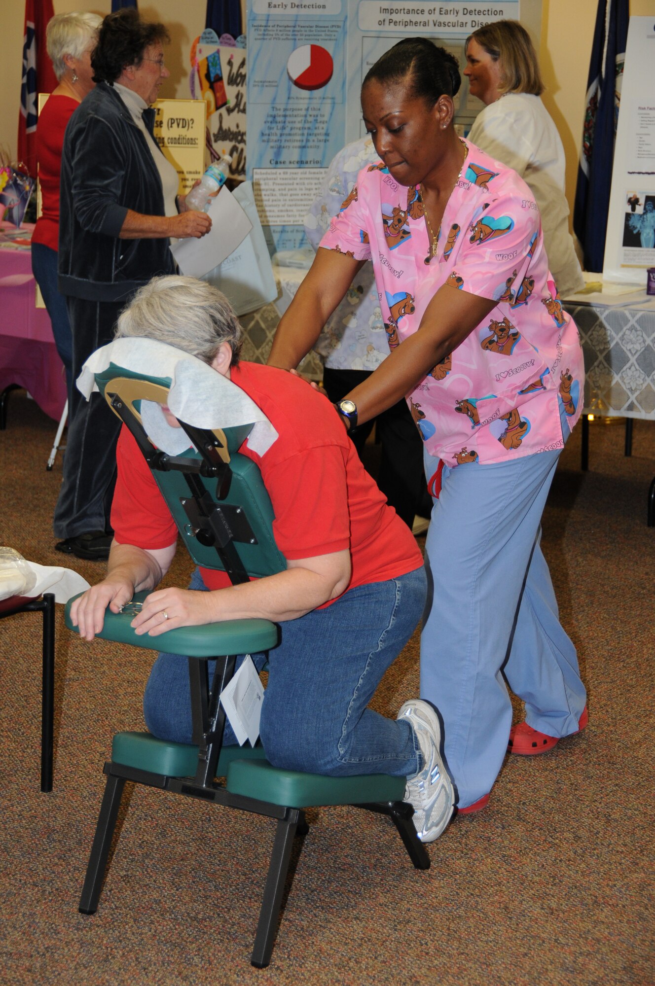 Karen Capehart of Ocean Springs gets a massage from Tech. Sgt. Kelly Randolph, 81st Inpatient Operations Squadron.  Her husband is retired Master Sgt. Gary Capehart.  (U.S. Air Force photo by Kemberly Groue)