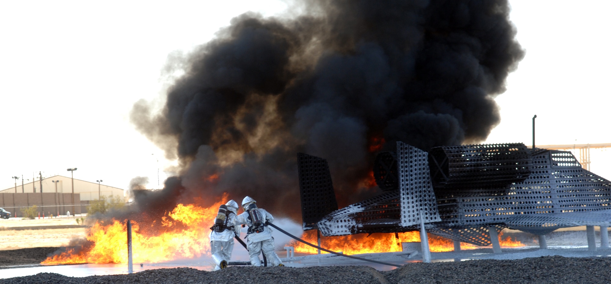 Davis-Monthan Air Force Fire Fighters, assigned to the 355th Civil Engineer Squadron, participate in a live-fire exercise, Oct. 21, using the P-19 Fire Fighting Truck, which uses technology that reduces the amount of water and foam needed to extinguish a fire. Currently only a number of P-19 are in uses in the Air Force, but the Air Force plans to purchase more P-19 Fire Fighting trucks in the future. 
