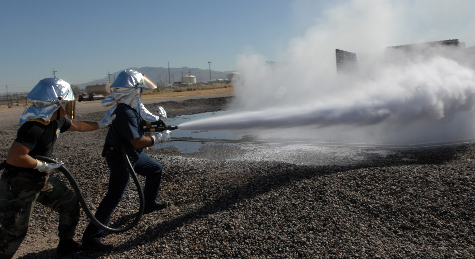 Davis-Monthan Air Force Fire Fighters, assigned to the 355th Civil Engineer Squadron, participate in a live-fire exercise, Oct. 21, using the P-19 Fire Fighting Truck, which uses technology that reduces the amount of water and foam needed to extinguish a fire. Currently only a number of P-19 are in uses in the Air Force, but the Air Force plans to purchase more P-19 Fire Fighting trucks in the future. 
